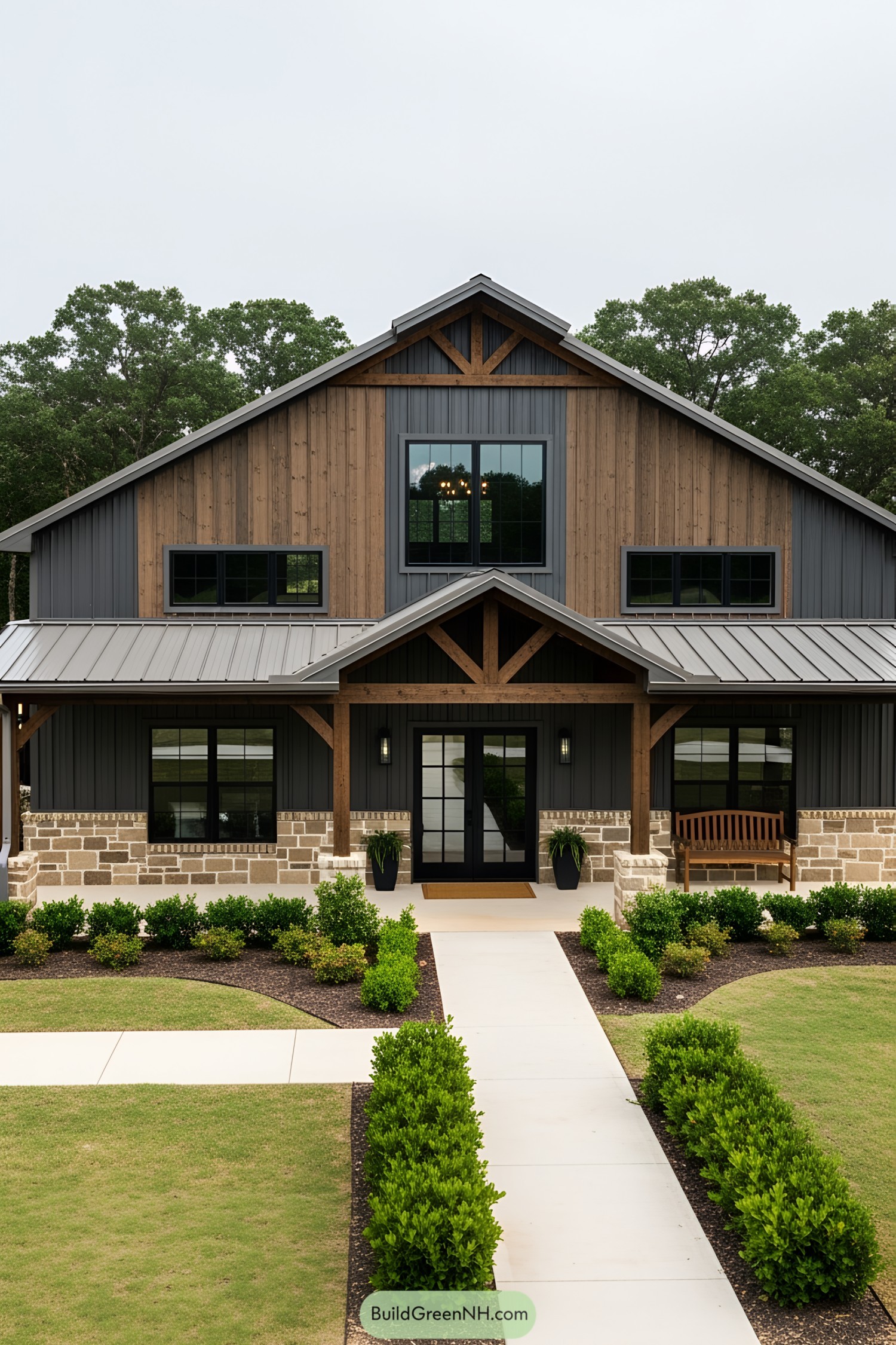 Barndominium with blend of wood, metal, and stone accents