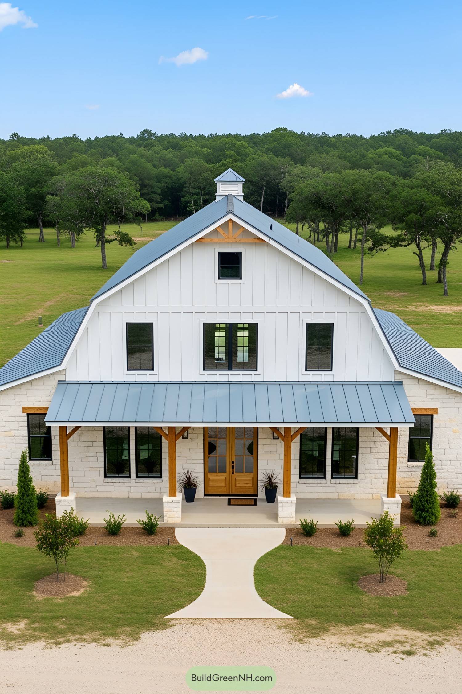 Stylish barndominium with stone and wood accents