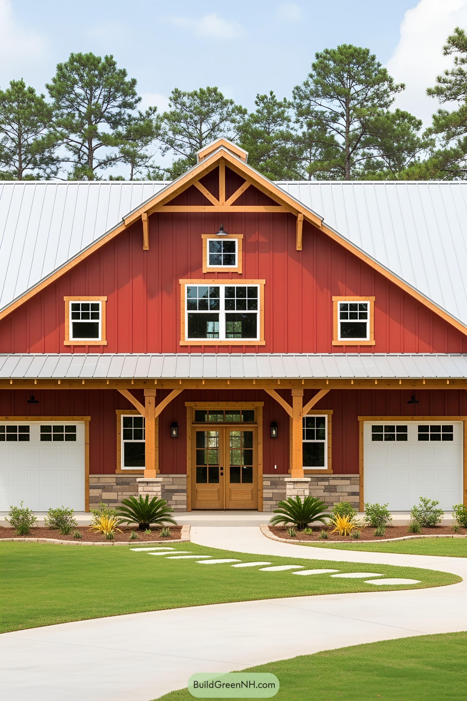 Barndominium with red siding and large windows