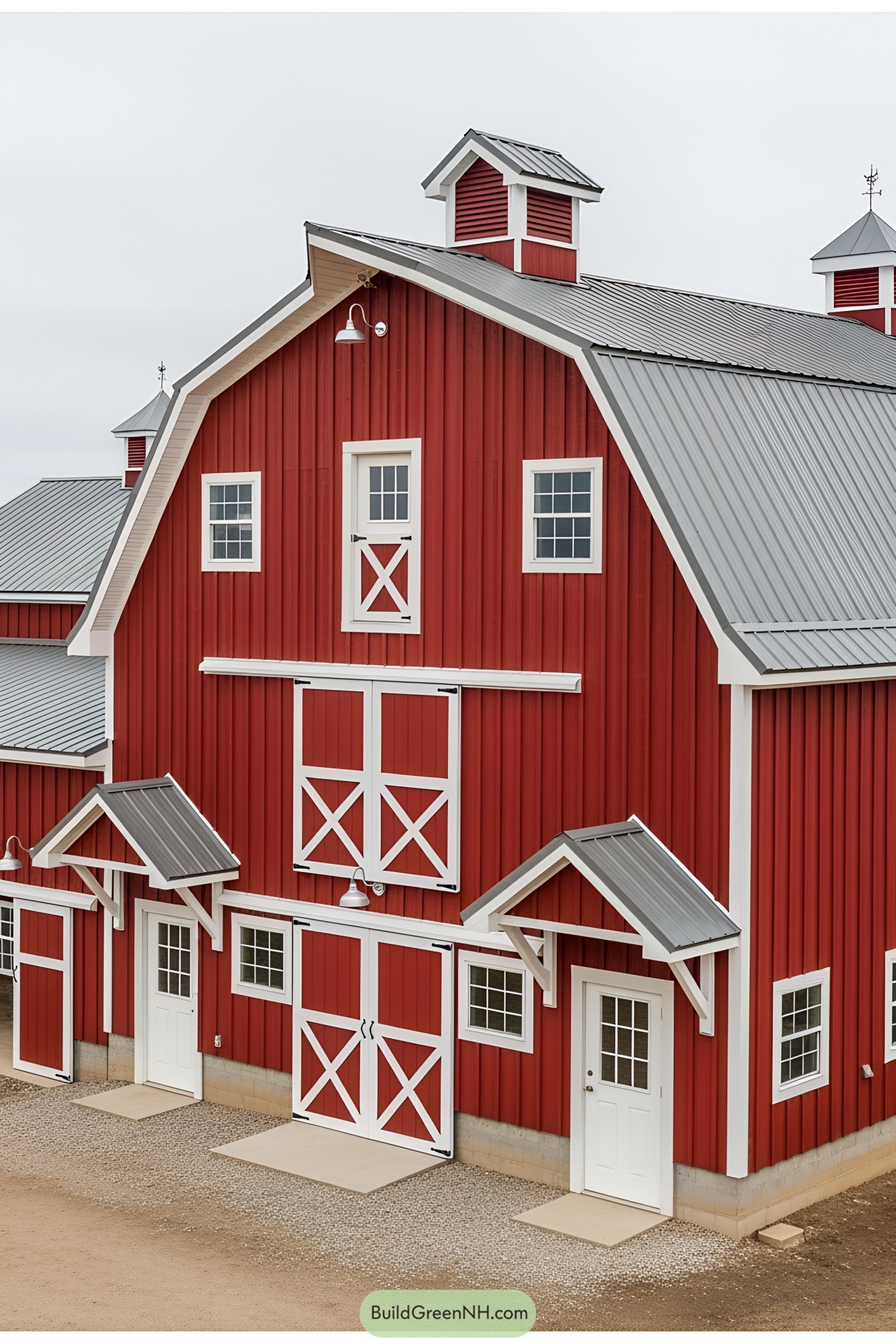Red barn house with white accents and grey roof