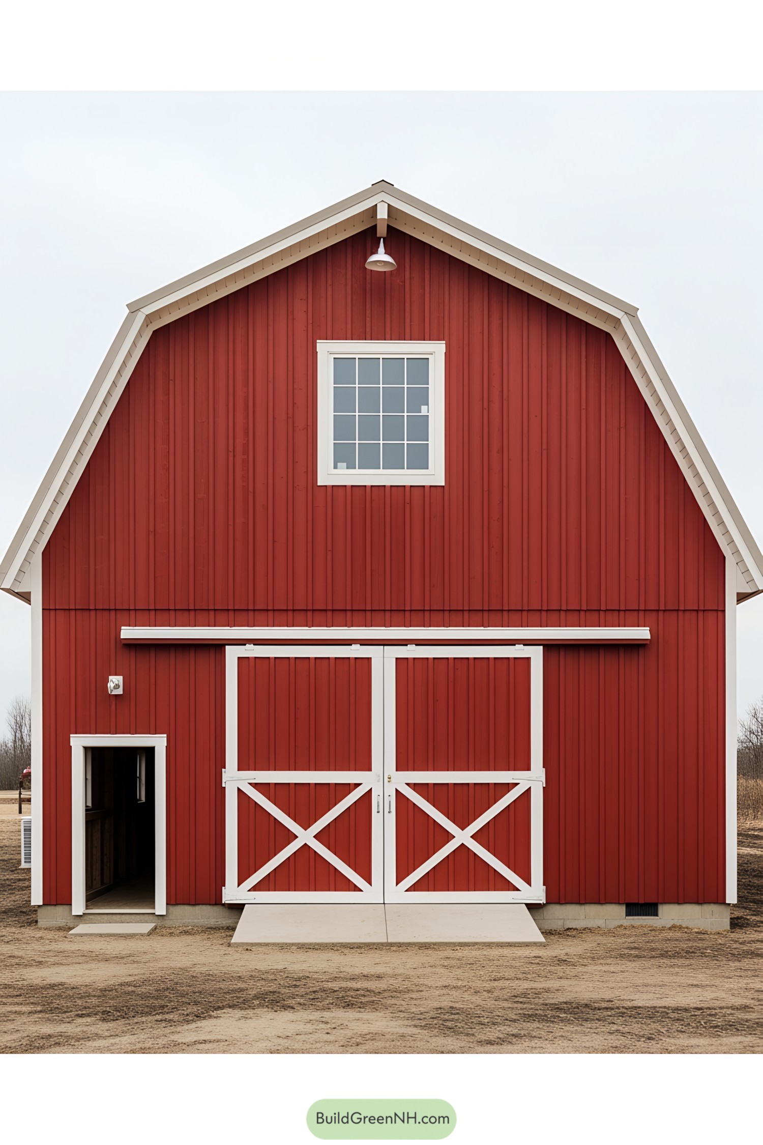 Classic red barn with white trim, featuring large double doors and a window