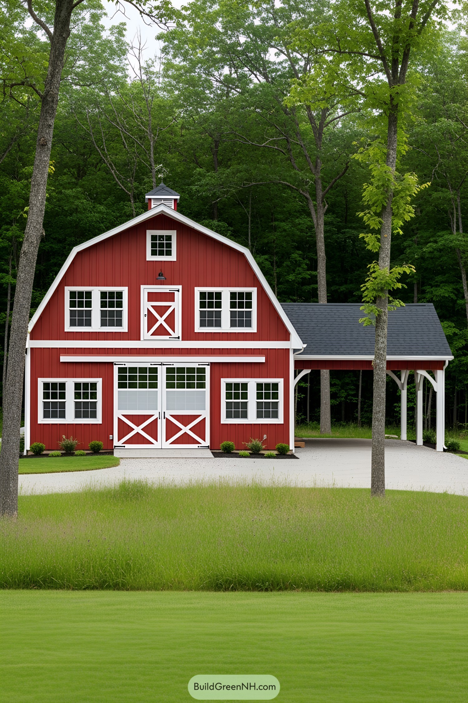 Classic red barn house with white accents surrounded by trees