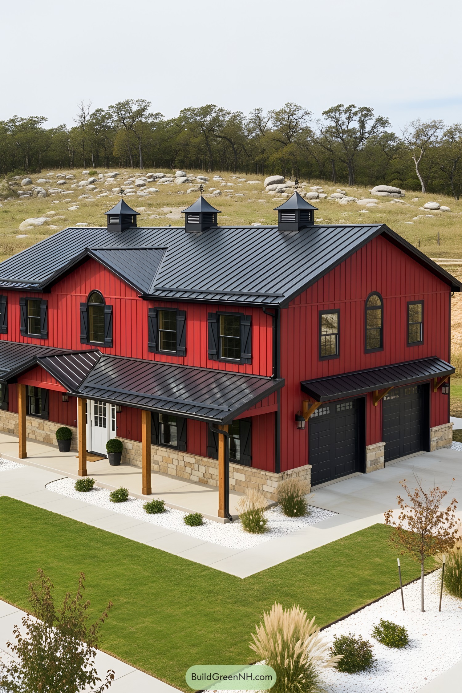 Charming red barndominium with black roof