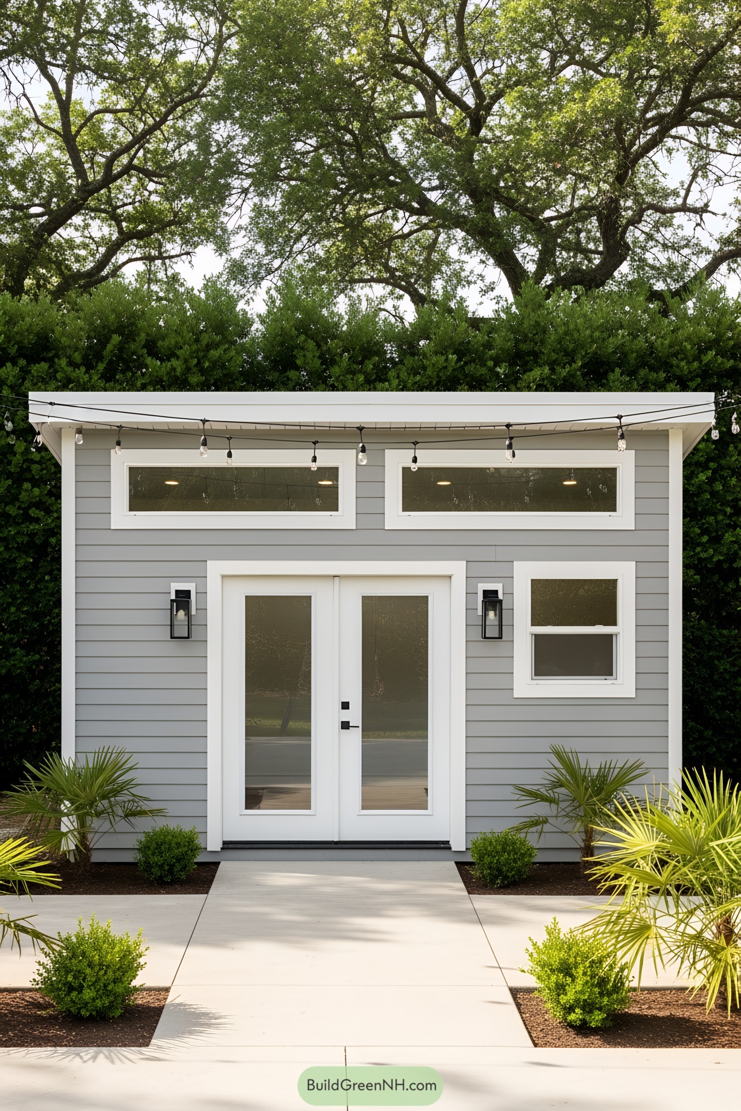 Modern shed office with glass doors and garden