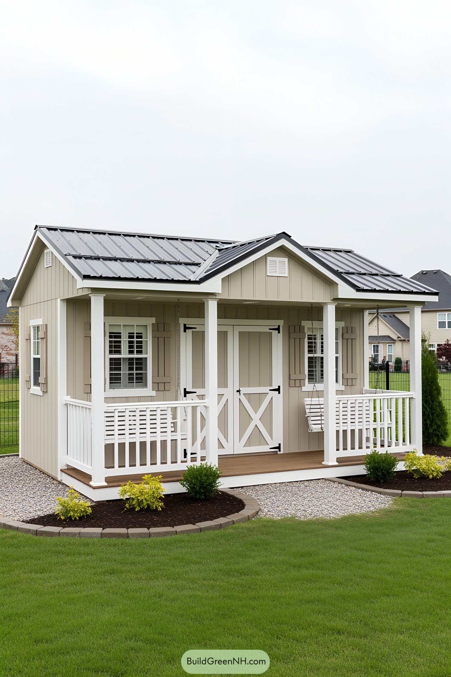 Cozy beige shed with white accents and porch swing
