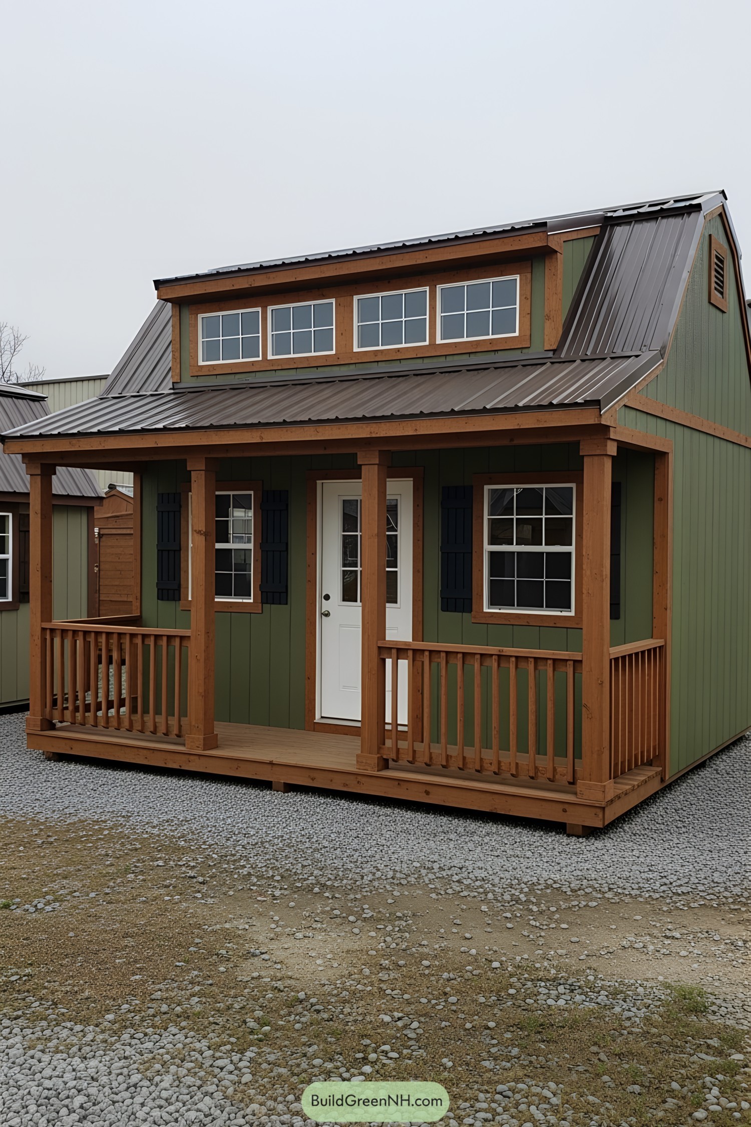 Cozy green shed with a welcoming porch