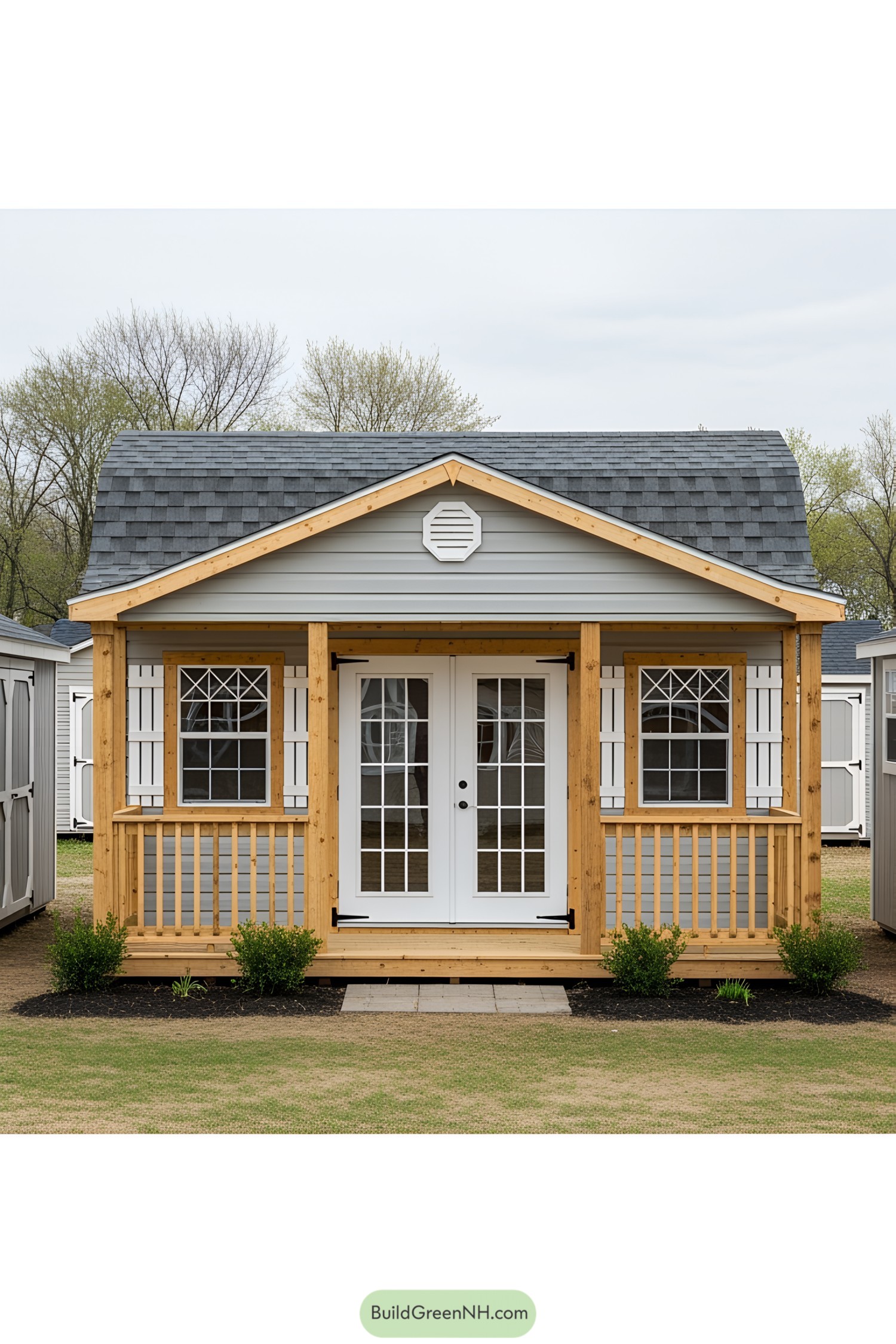 Charming small shed with a wooden porch and double doors