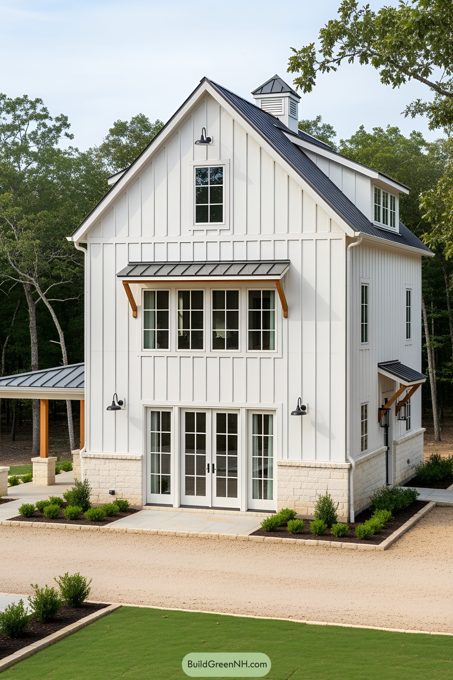 Tall white barndominium with a modern twist