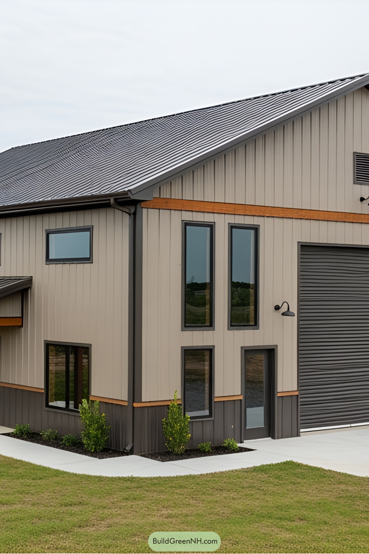 Modern barndominium with beige and gray exterior