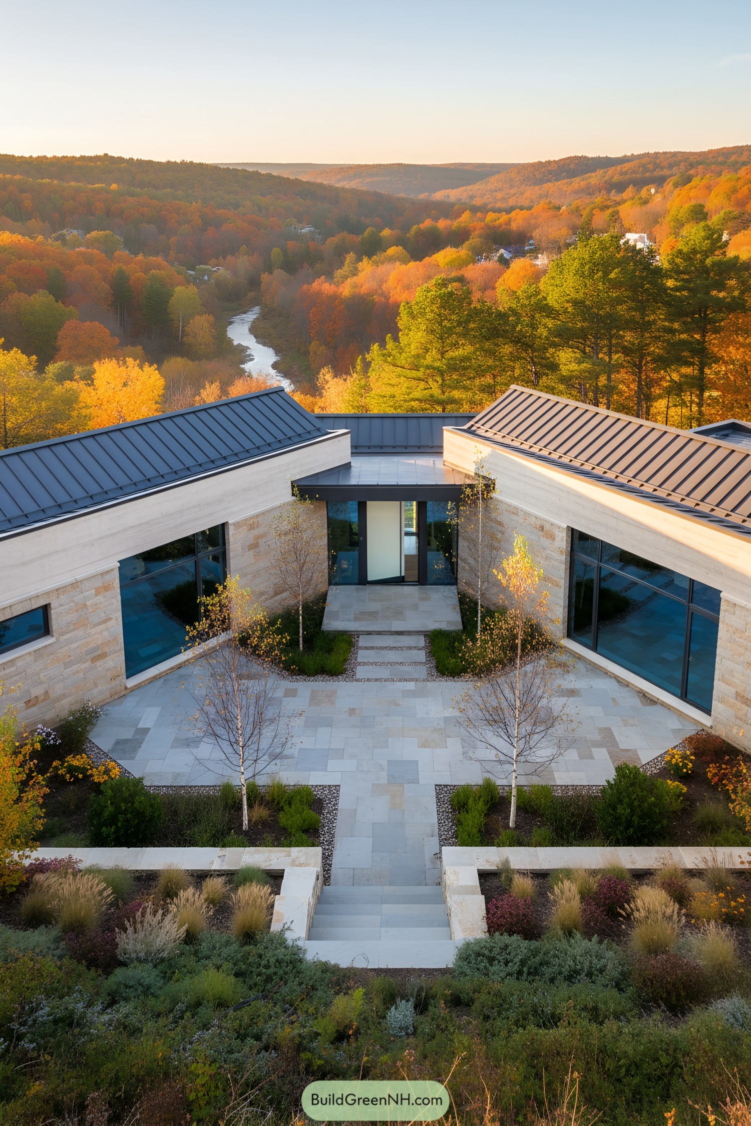 U-shaped house nestled on a hillside with a courtyard