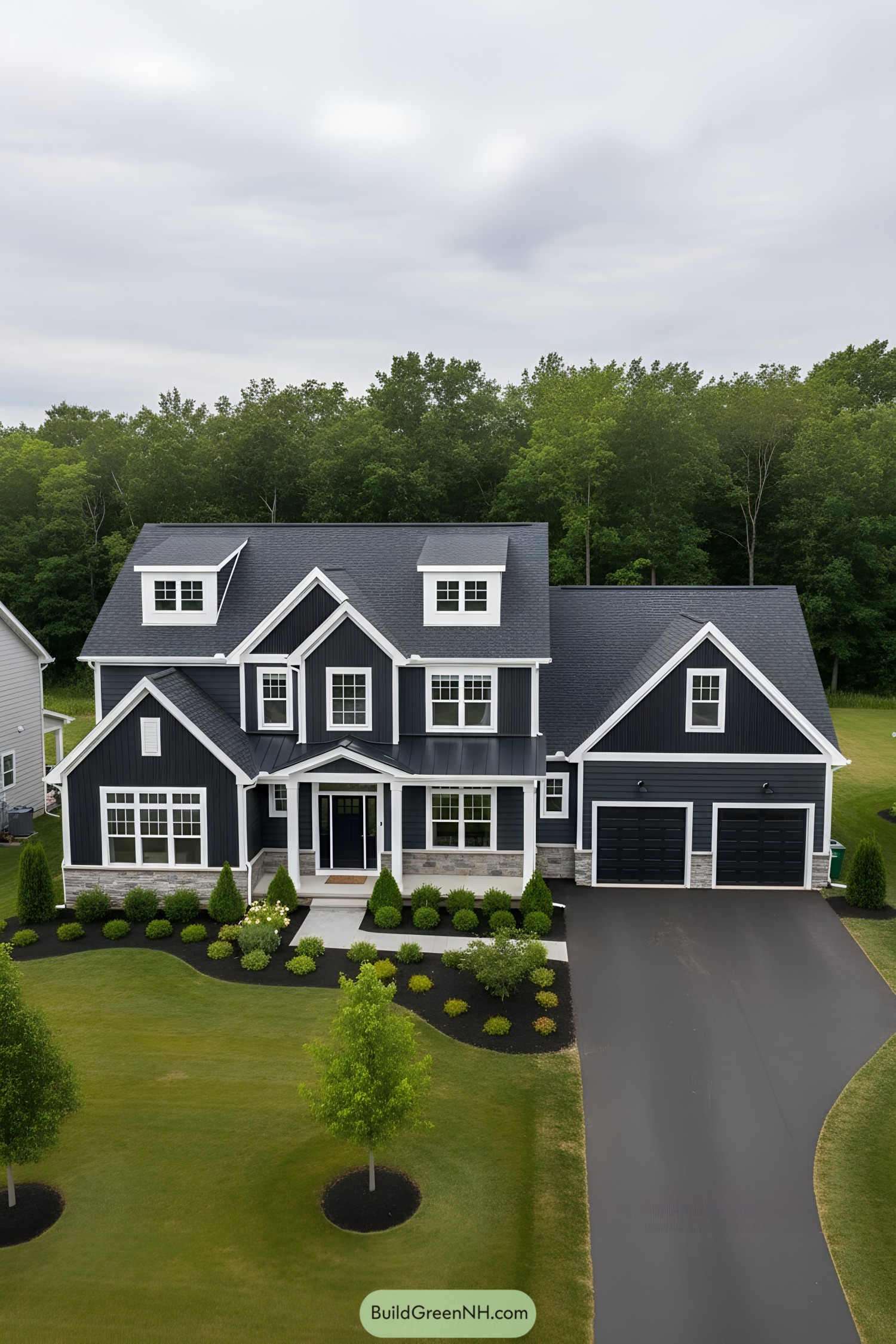 Modern black suburban house with two garages