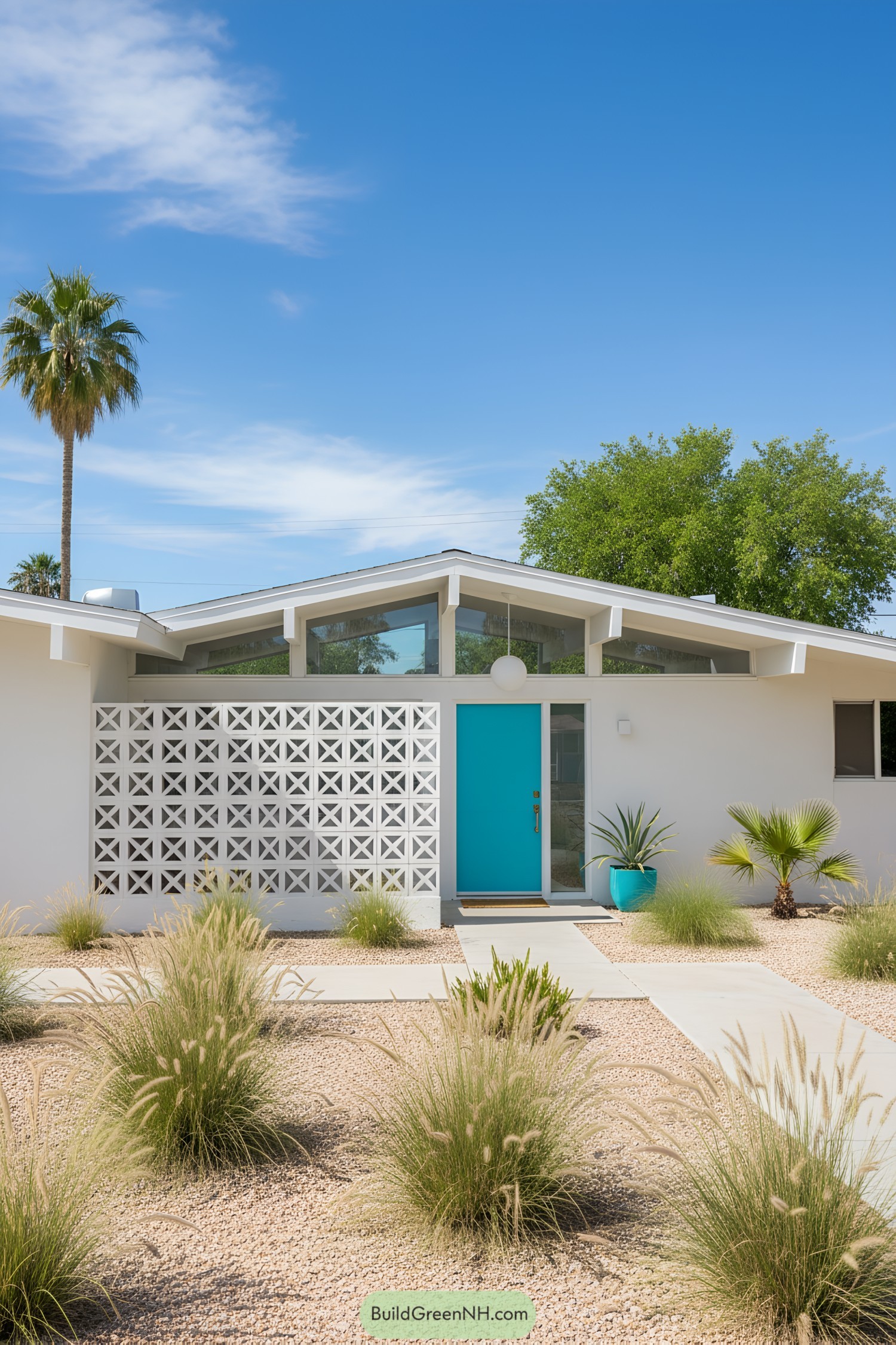 Bright mid-century house with turquoise door and geometric wall