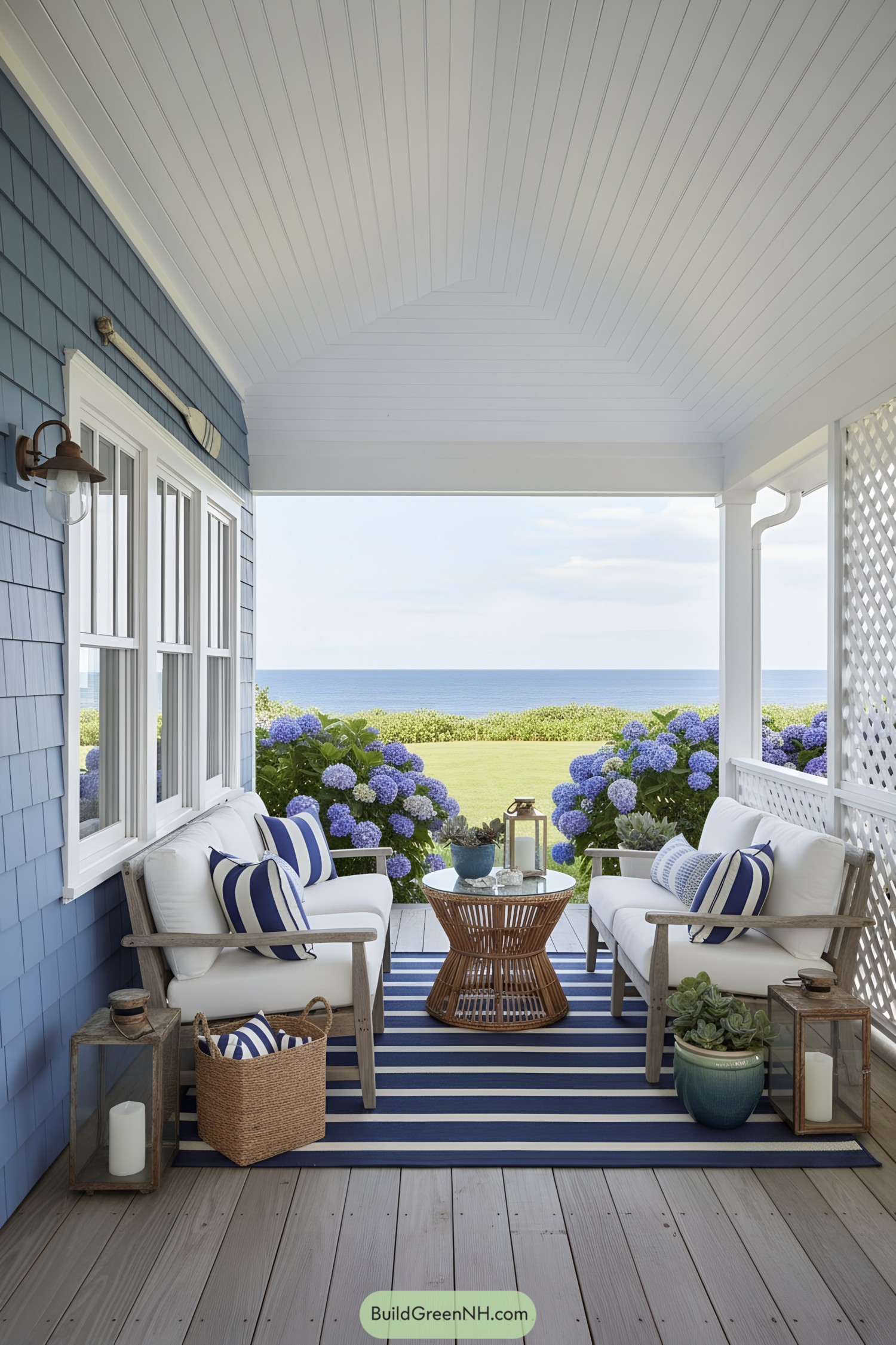 Cozy porch with ocean view and vibrant flowers