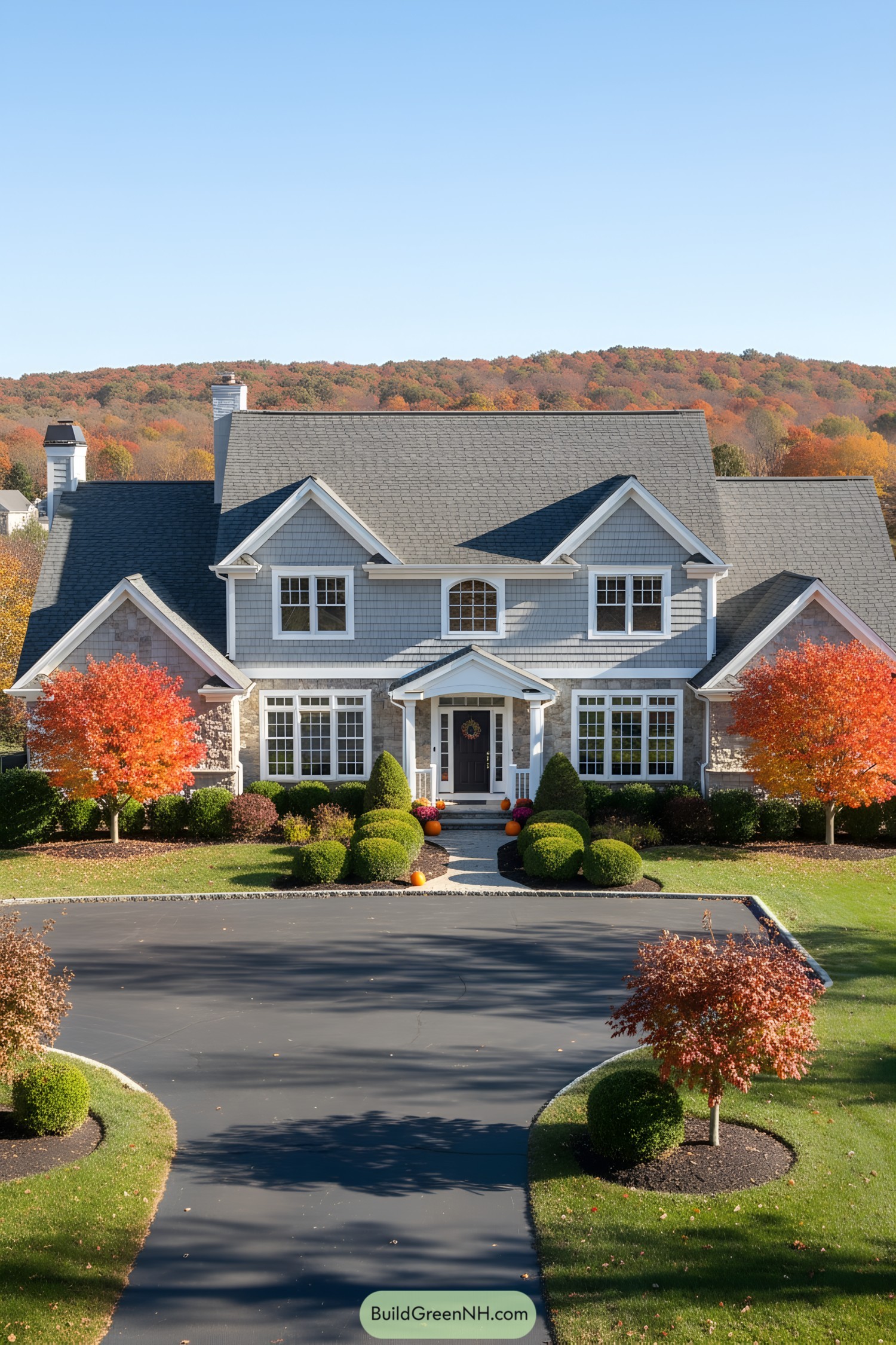 Suburban house with colorful fall trees