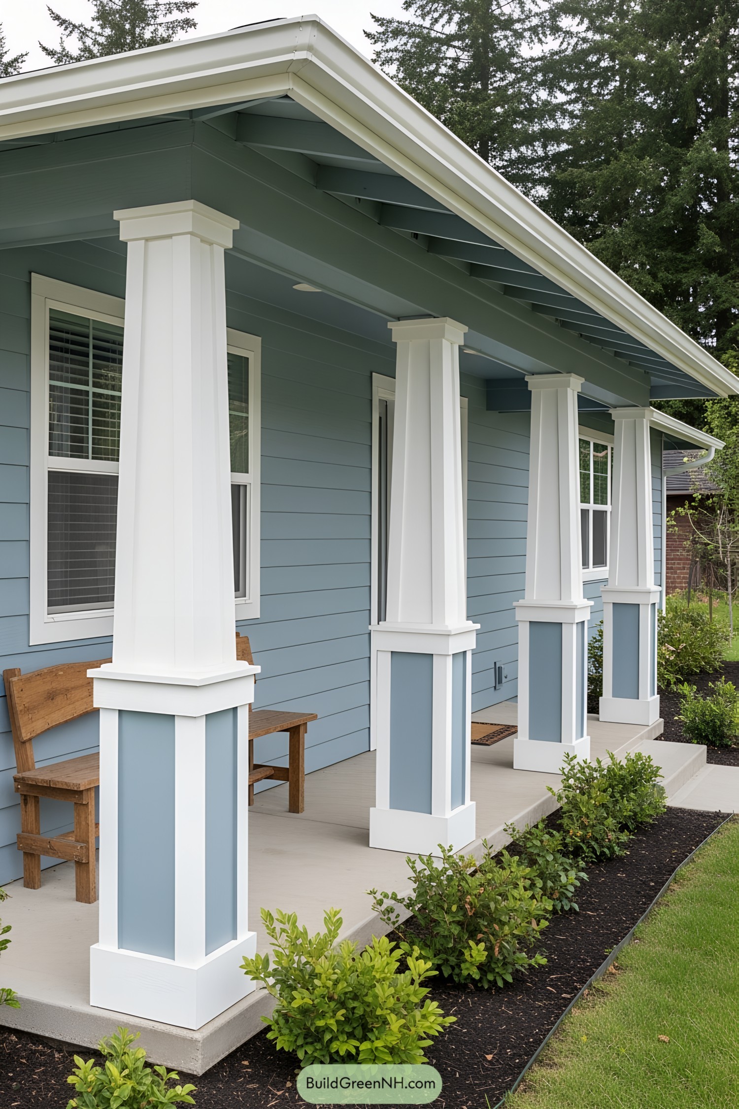 Front porch with bold white and blue columns