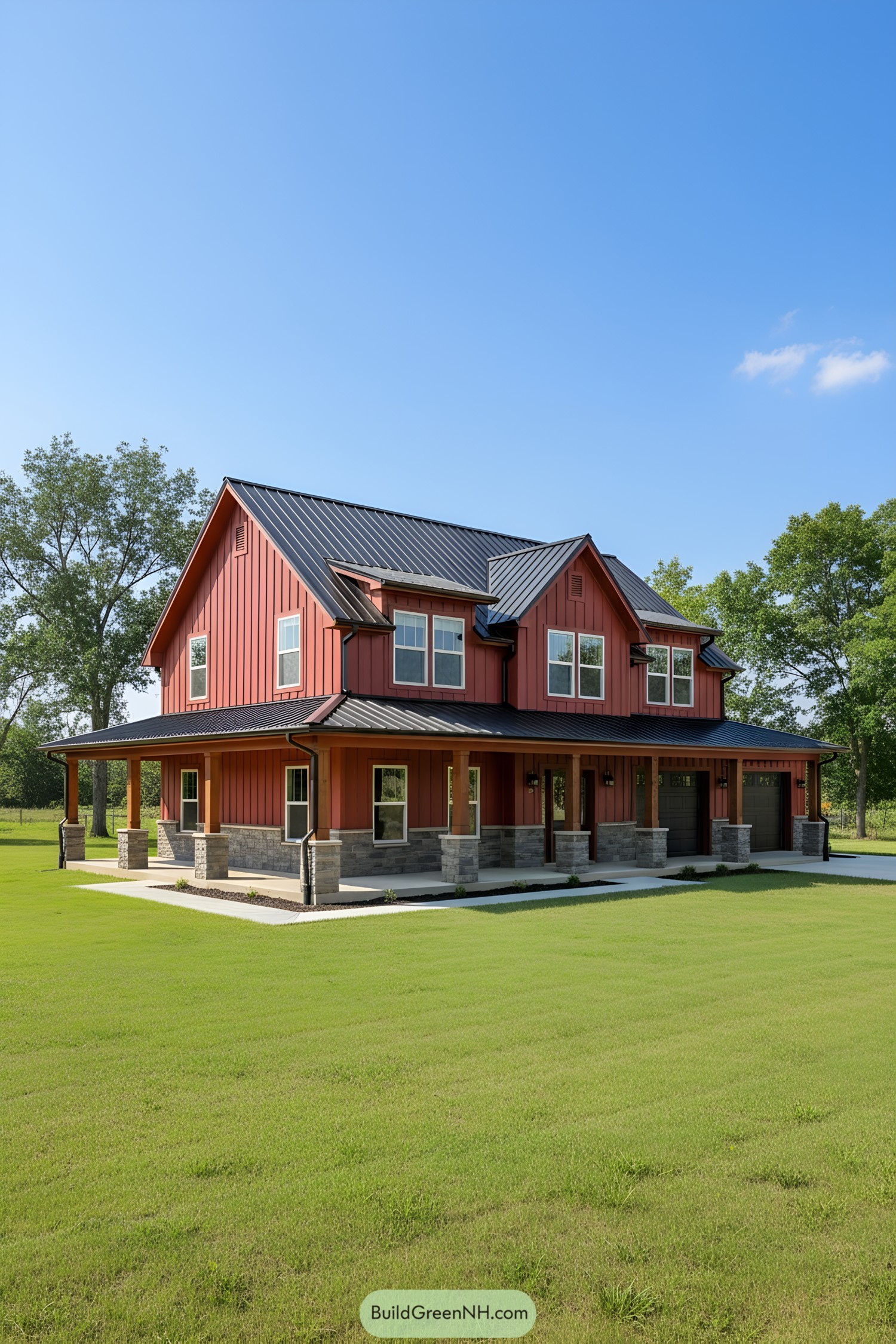 A red barndominium with a wraparound porch