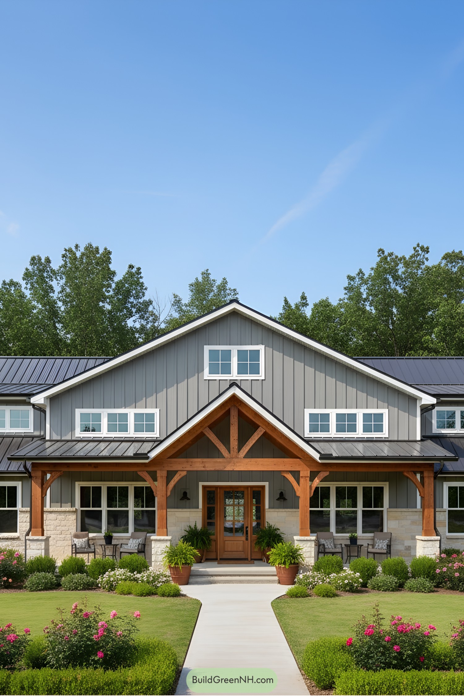 Craftsman barndominium with manicured garden