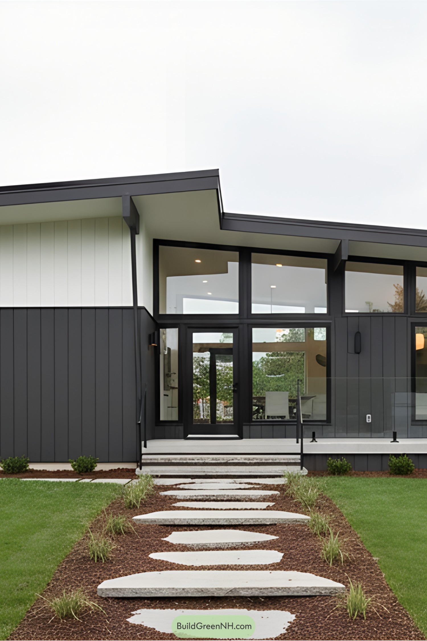 Modern bungalow with pathway and glass facade