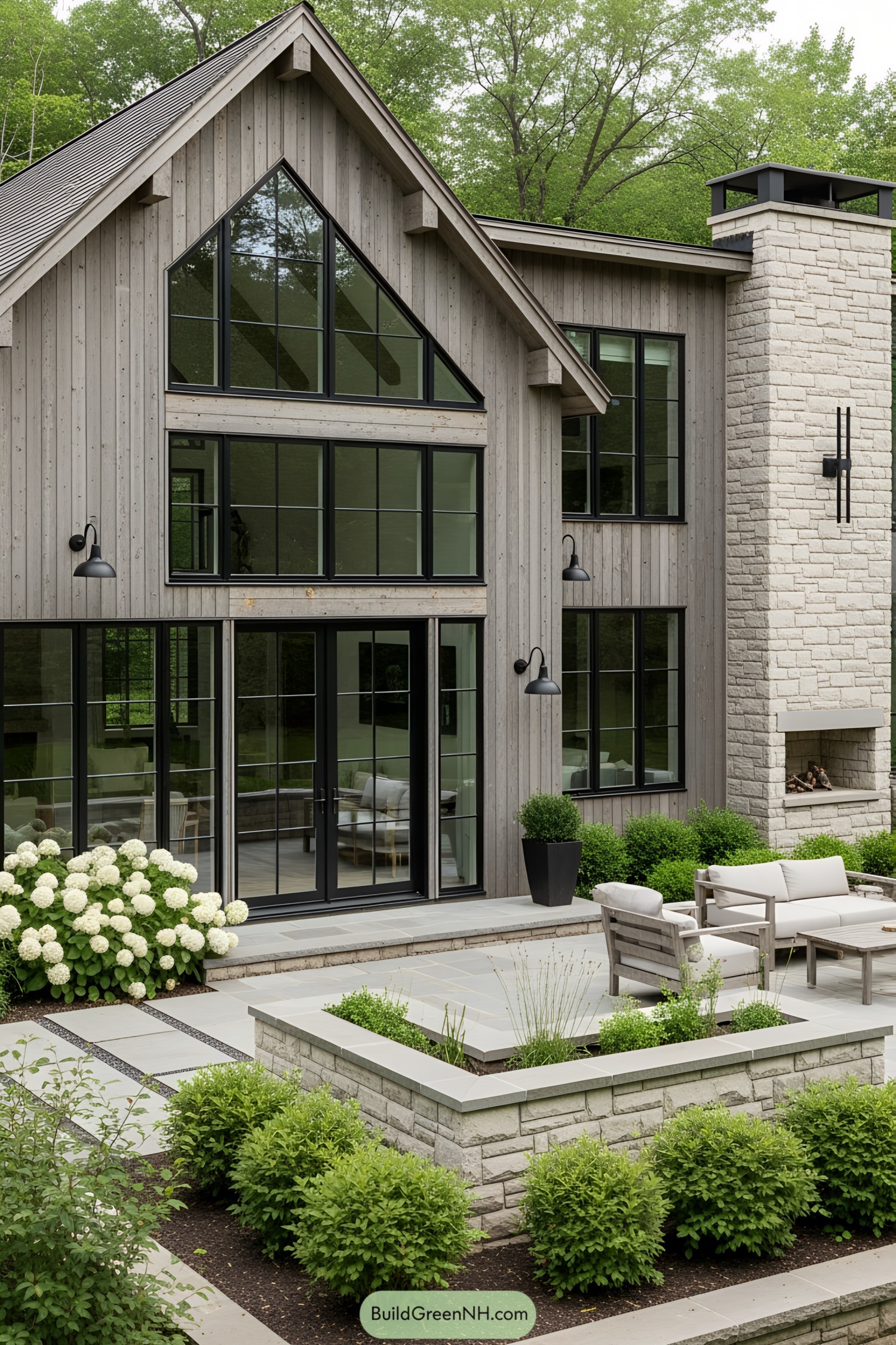 Cozy cottage with stone chimney and large windows