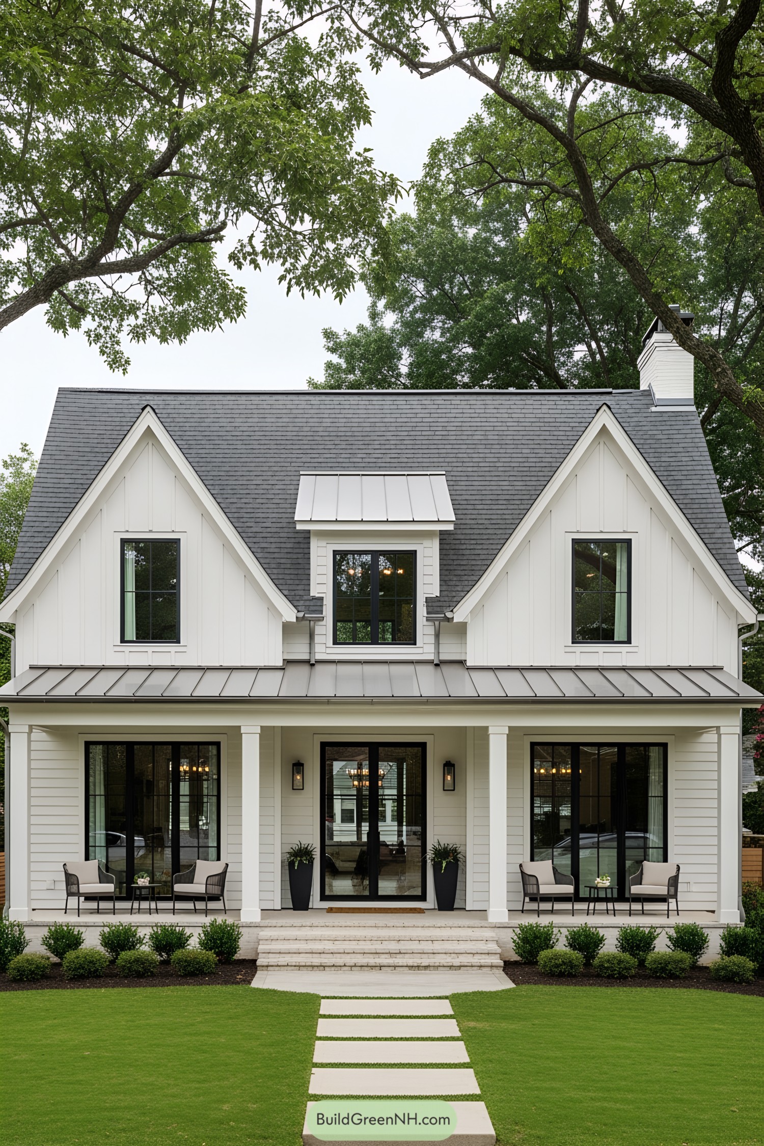 Charming white cottage with double gables and a welcoming porch