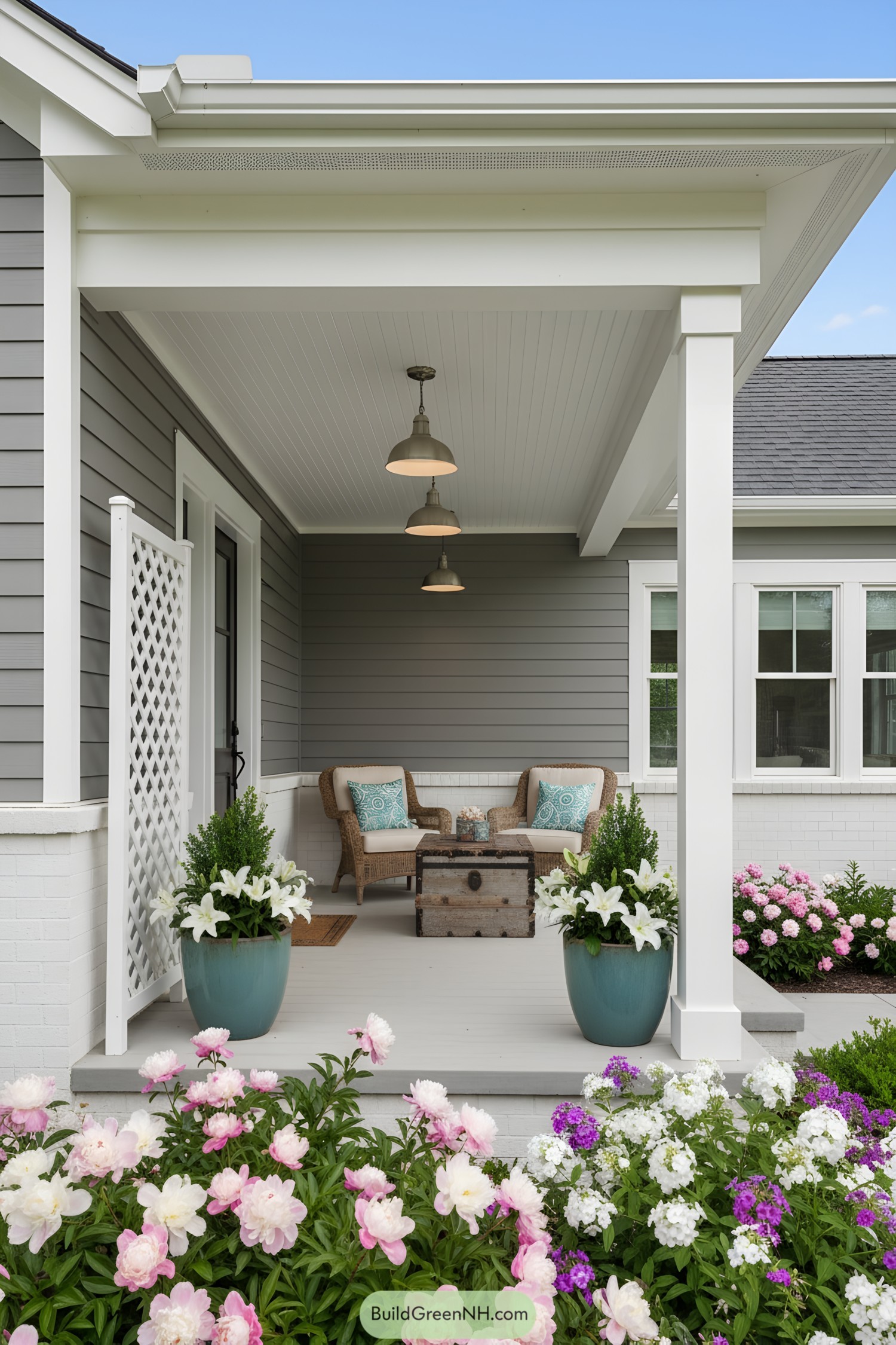 Cozy porch with wicker chairs and vibrant flowers