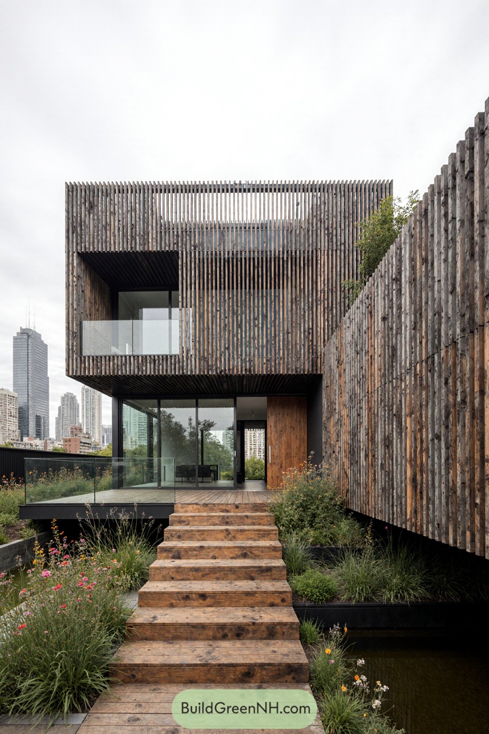 Modern house with vertical timber slats and glass accents