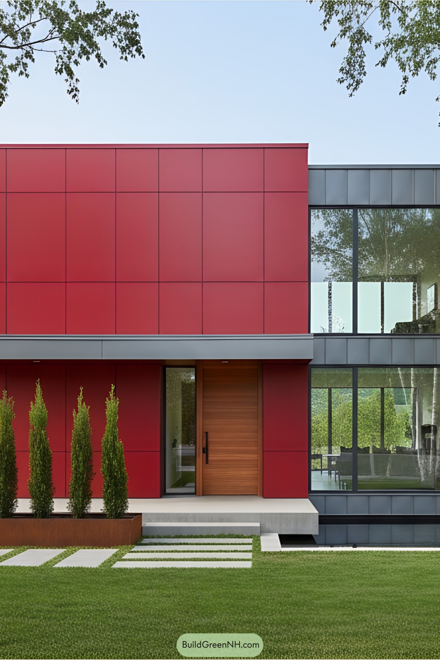Red modern house with large windows and sleek design