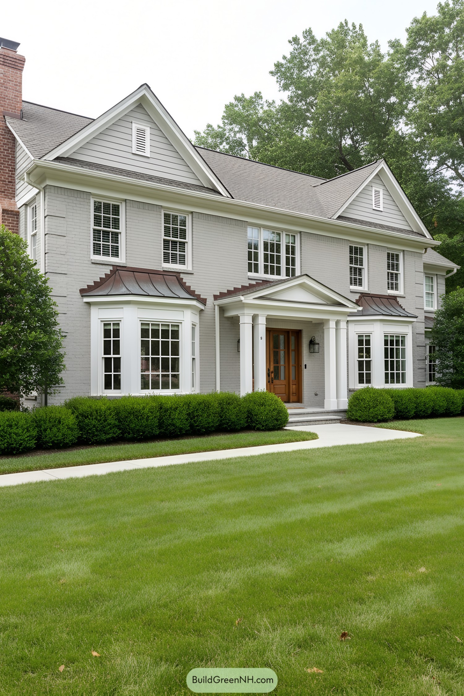 Elegant suburban house with wide, green lawn