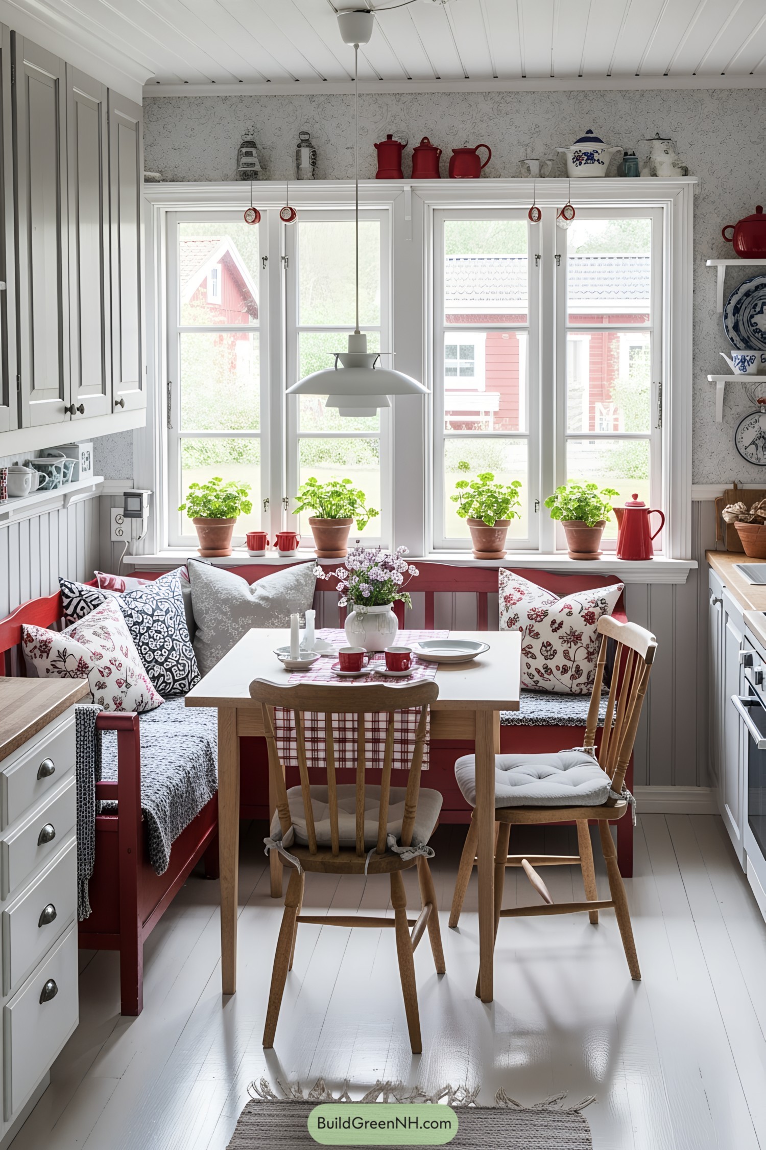 Charming Scandinavian cottage kitchen with red accents