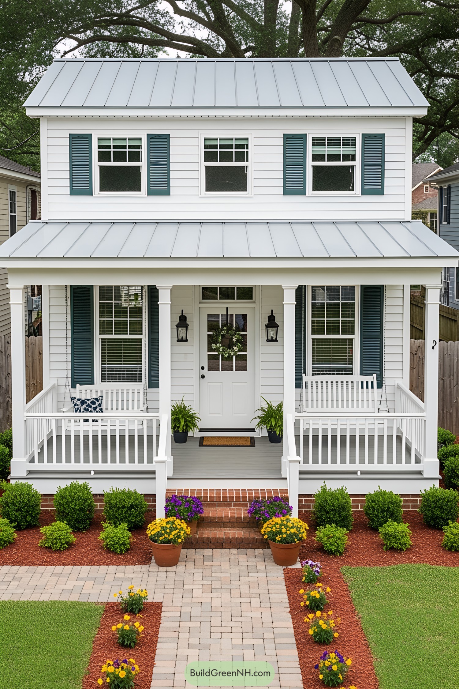 White house with blue shutters and welcoming front porch