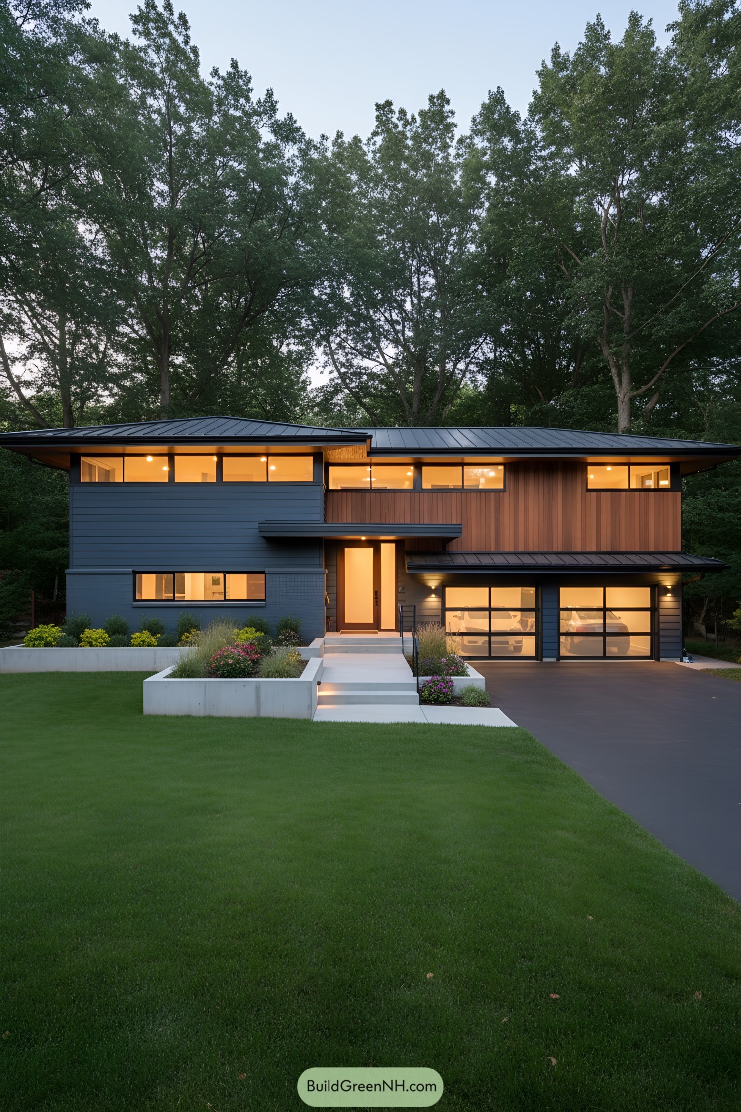 Split level mid-century modern home with large windows and a lush lawn