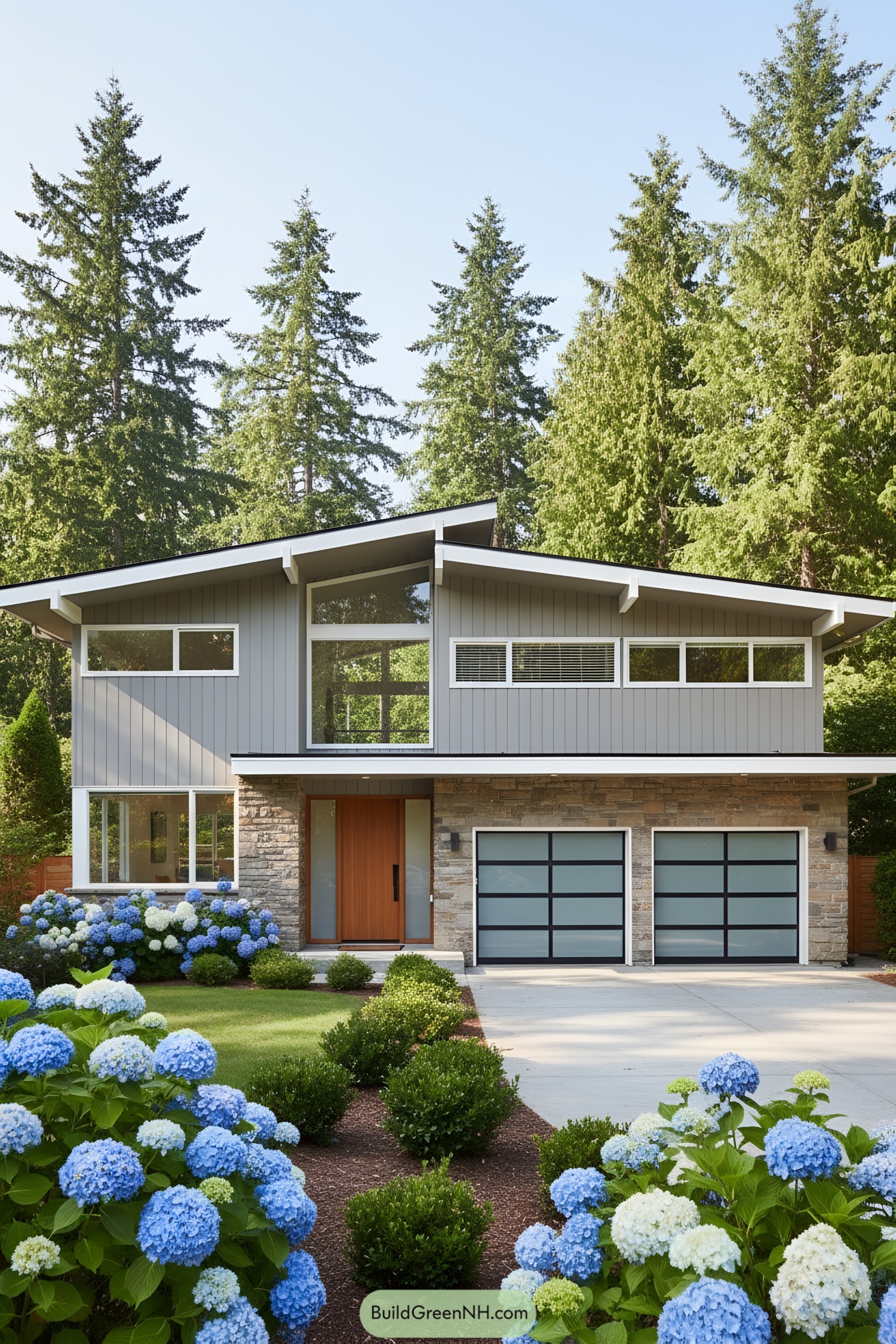 Two-story mid-century modern house surrounded by trees and hydrangeas