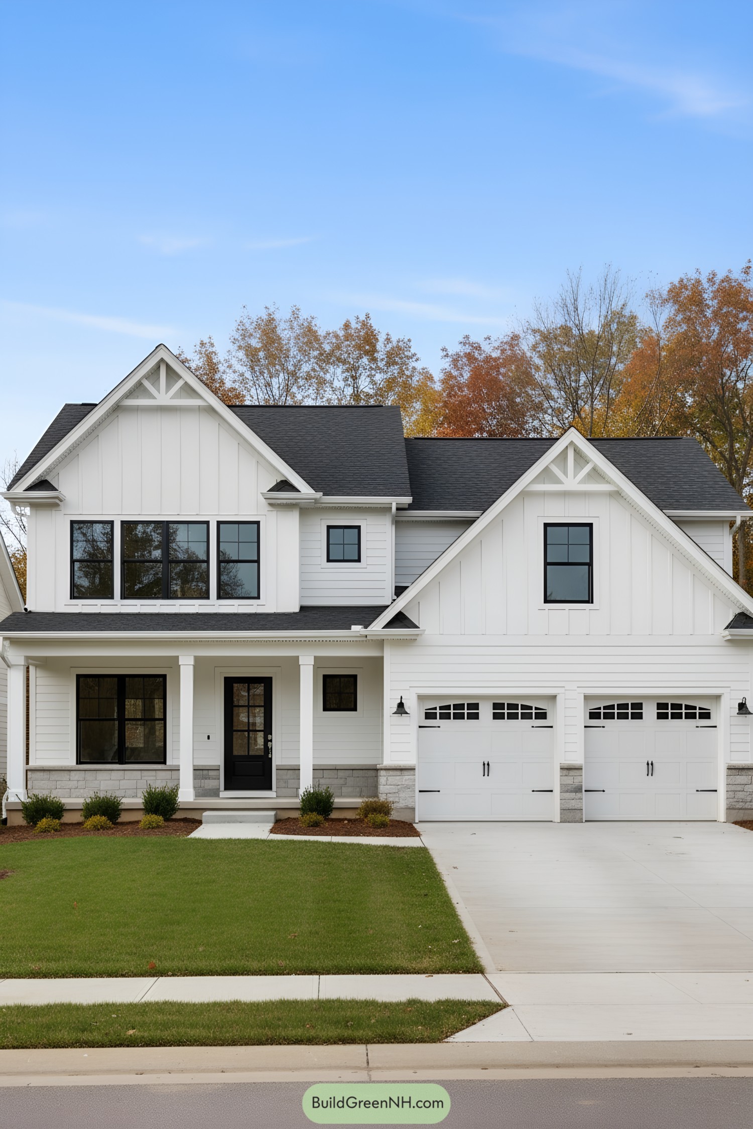 Charming white suburban house with a green lawn