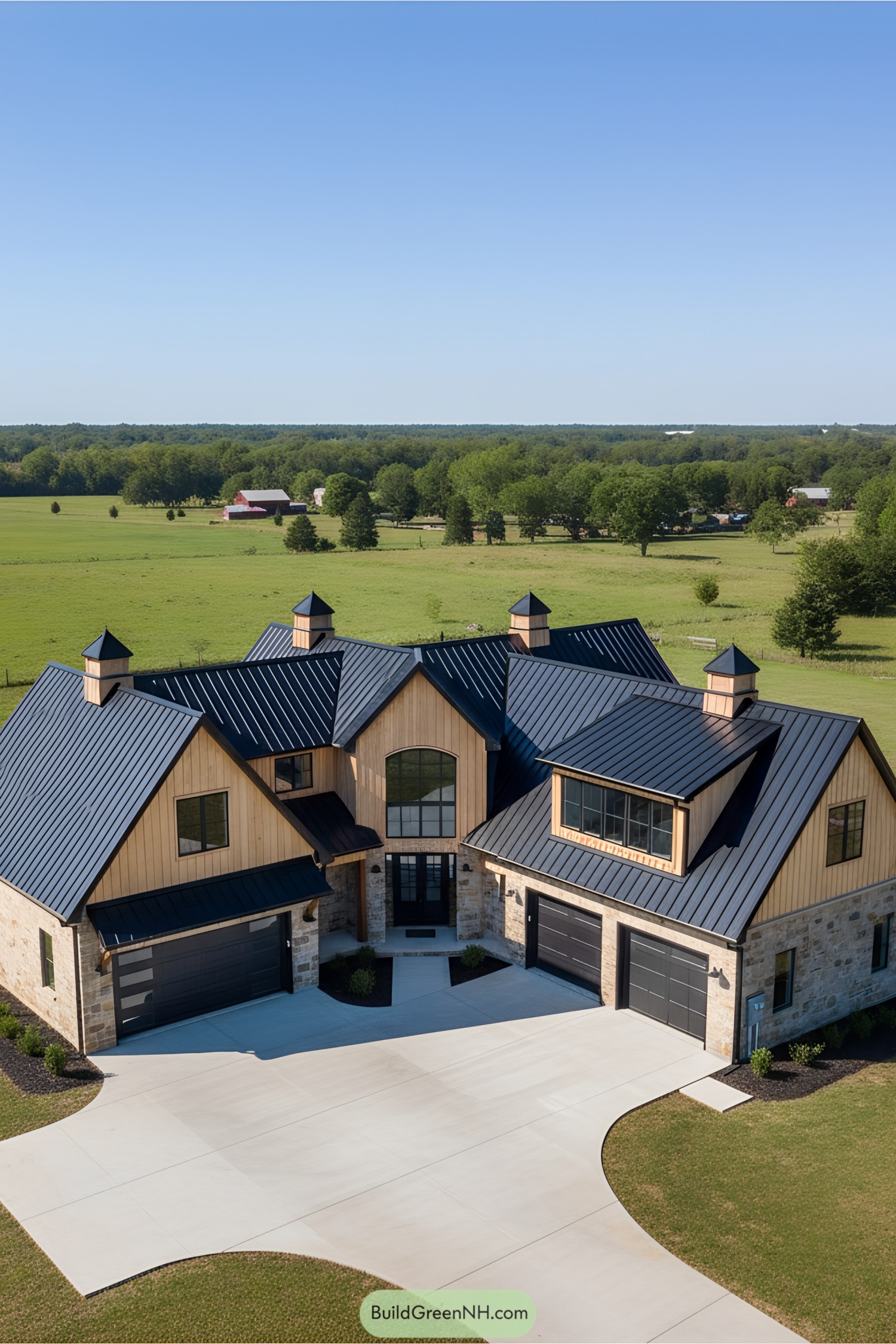 Dual-gabled house with metal roof in a countryside setting