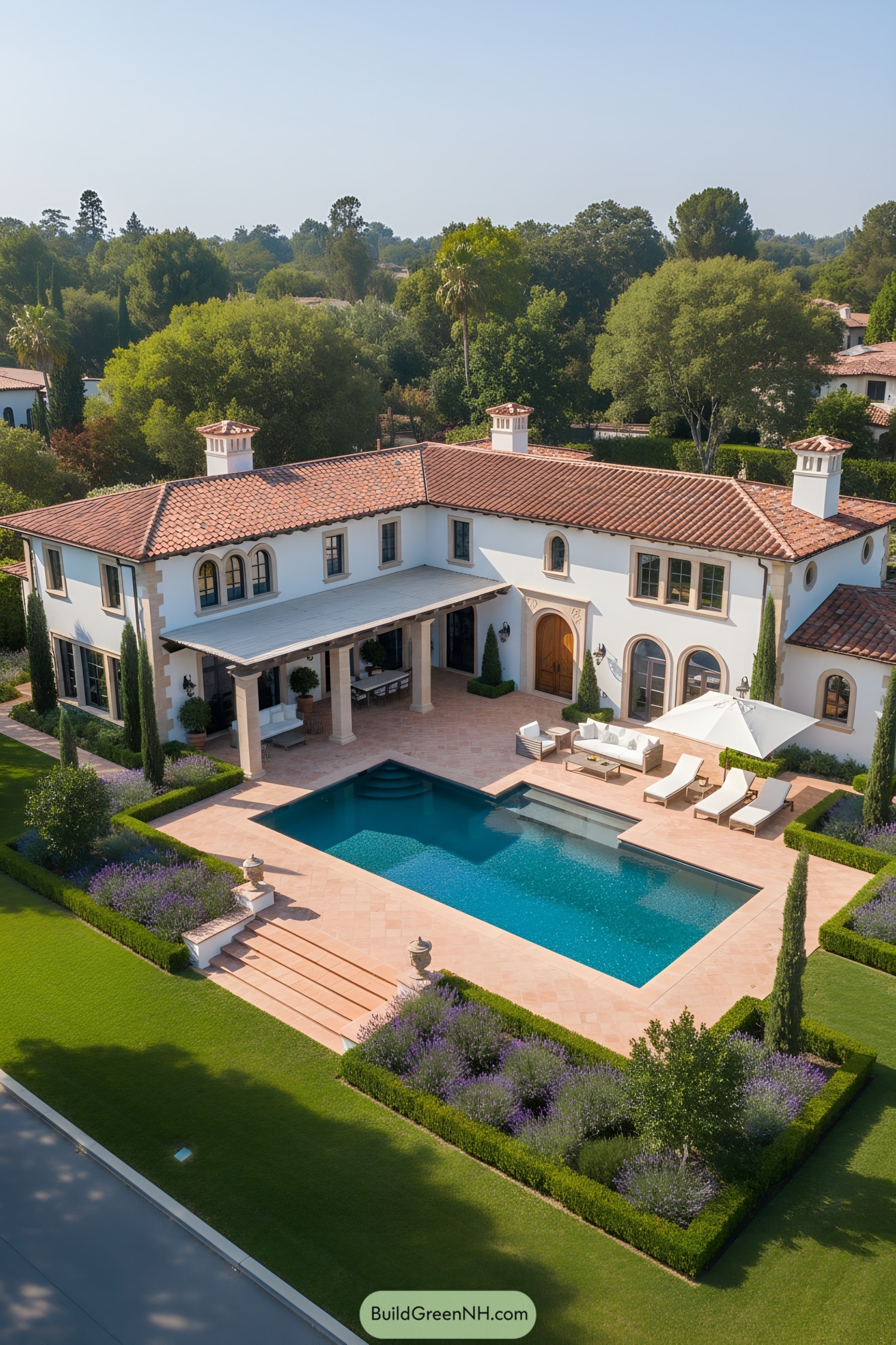 Mediterranean mansion with terracotta roofs and a sparkling pool