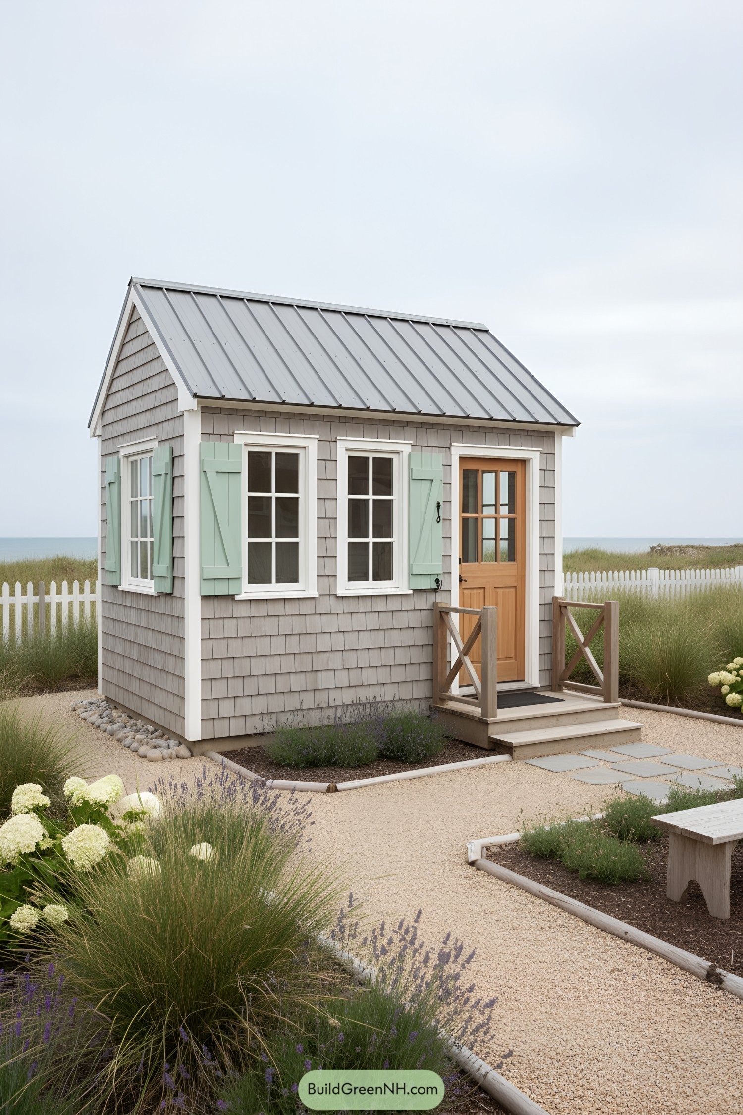 Small shingled shed with mint shutters