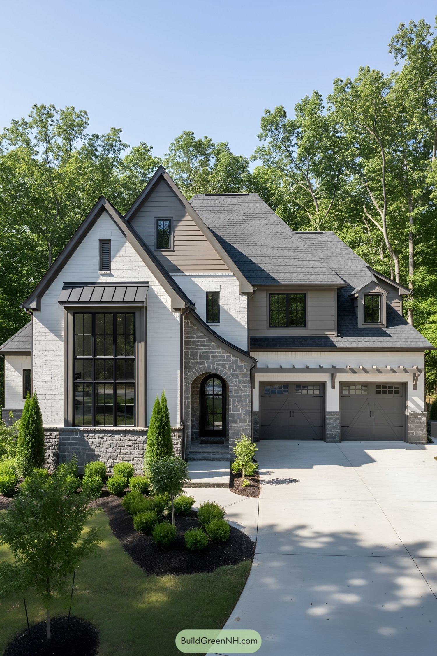 Modern Tudor with steep gables and stone accents