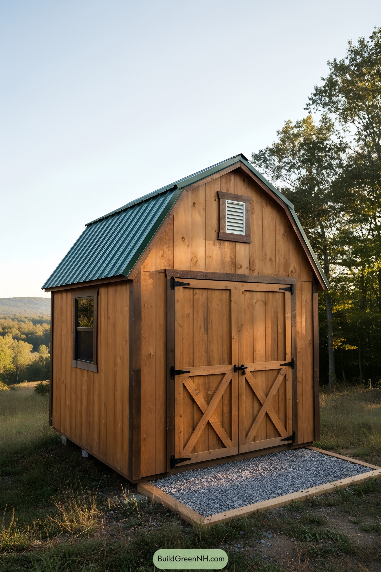 Small gambrel-roof shed with green metal roof, cedar siding, and double barn doors