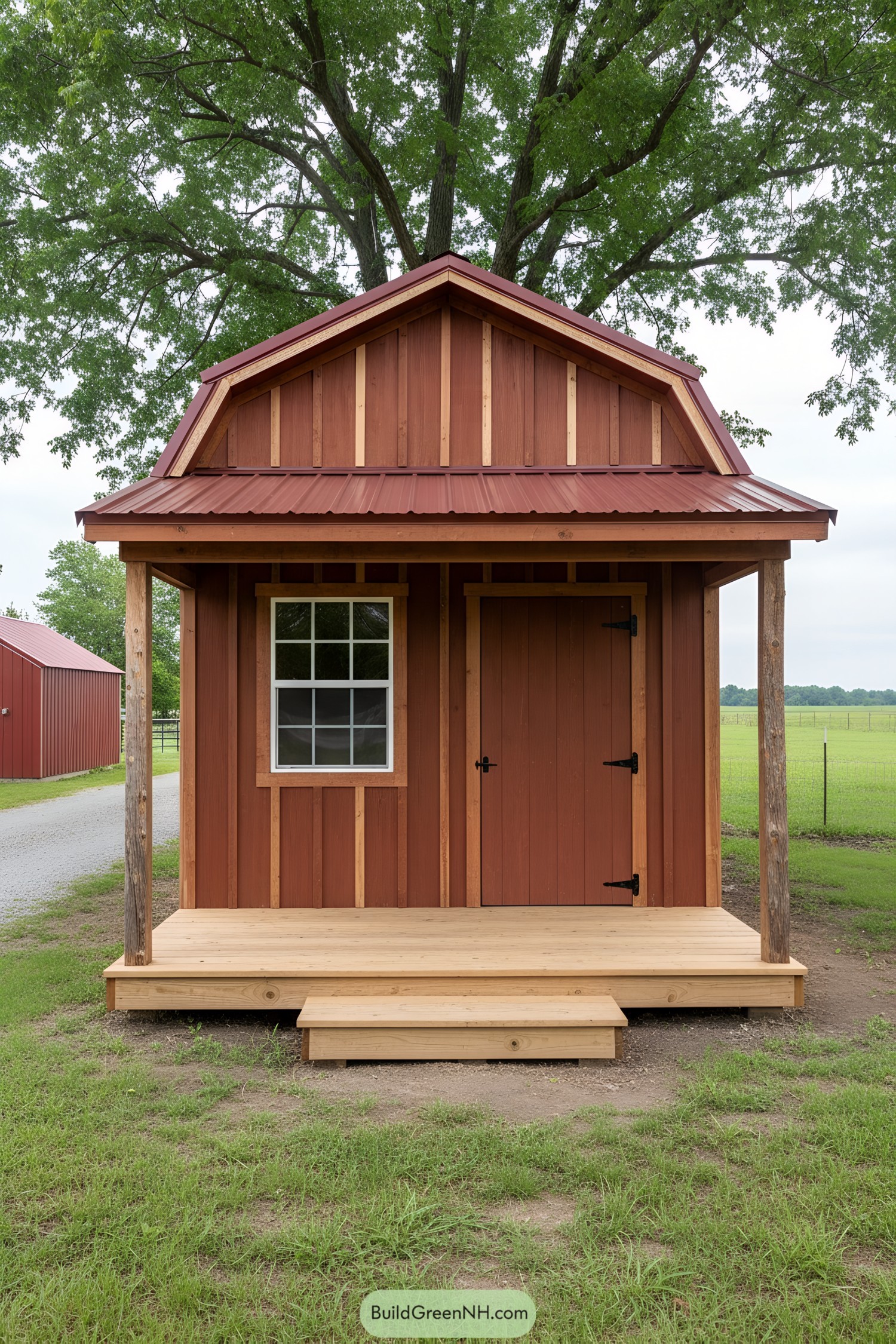 Rustic red shed with porch and gambrel roof