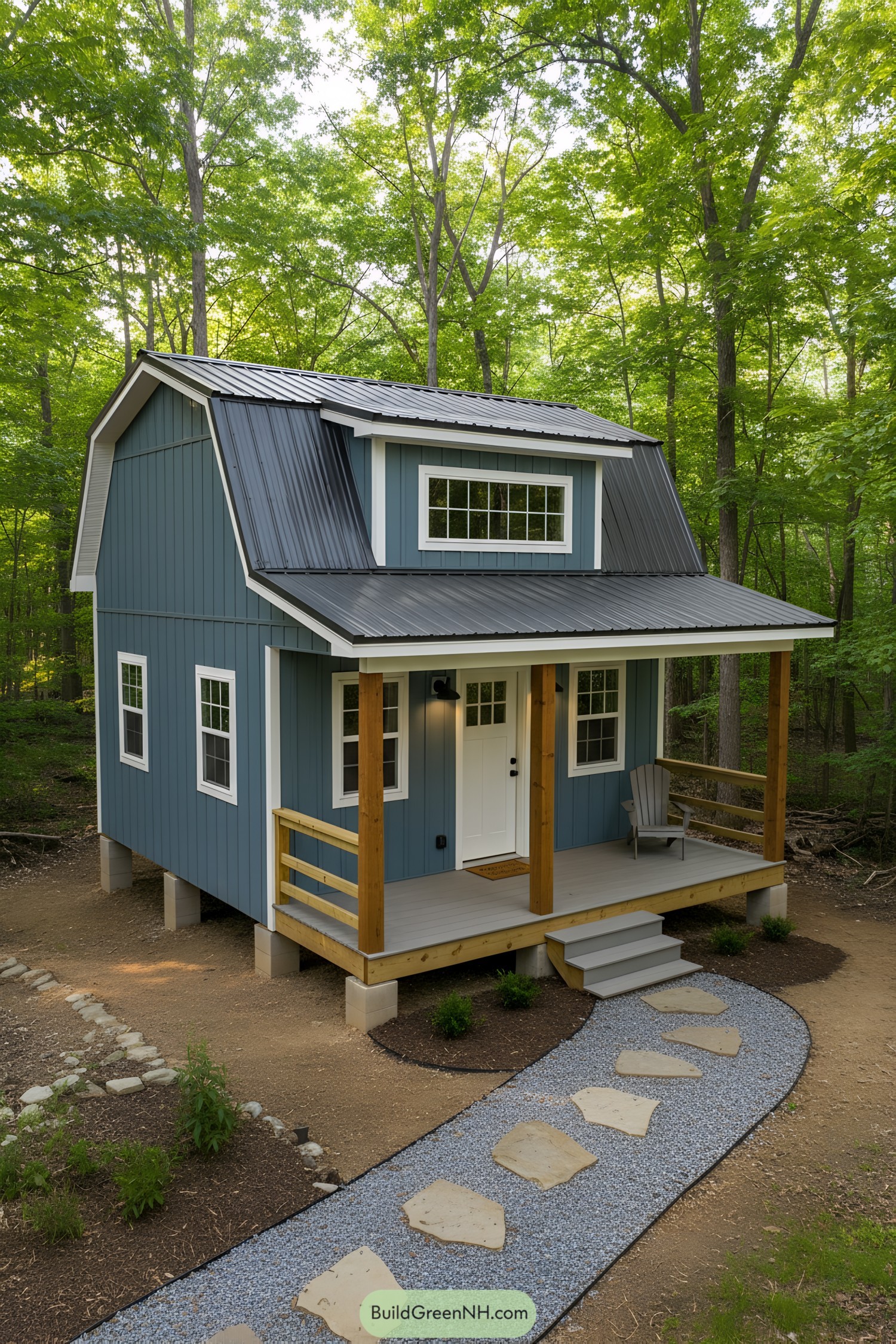 Blue shed-cabin with gambrel roof and porch