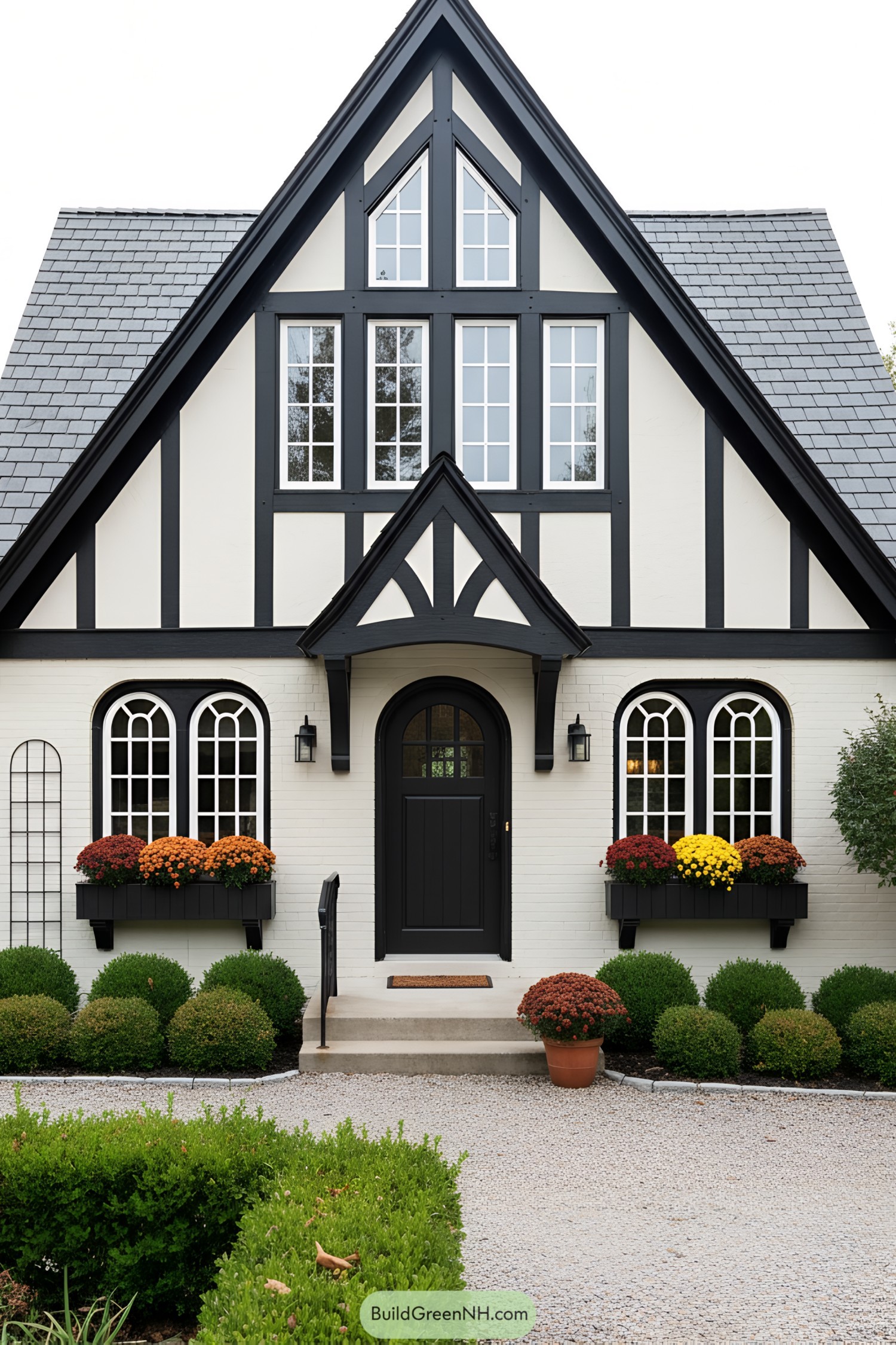 Black-and-white Tudor cottage with arched windows