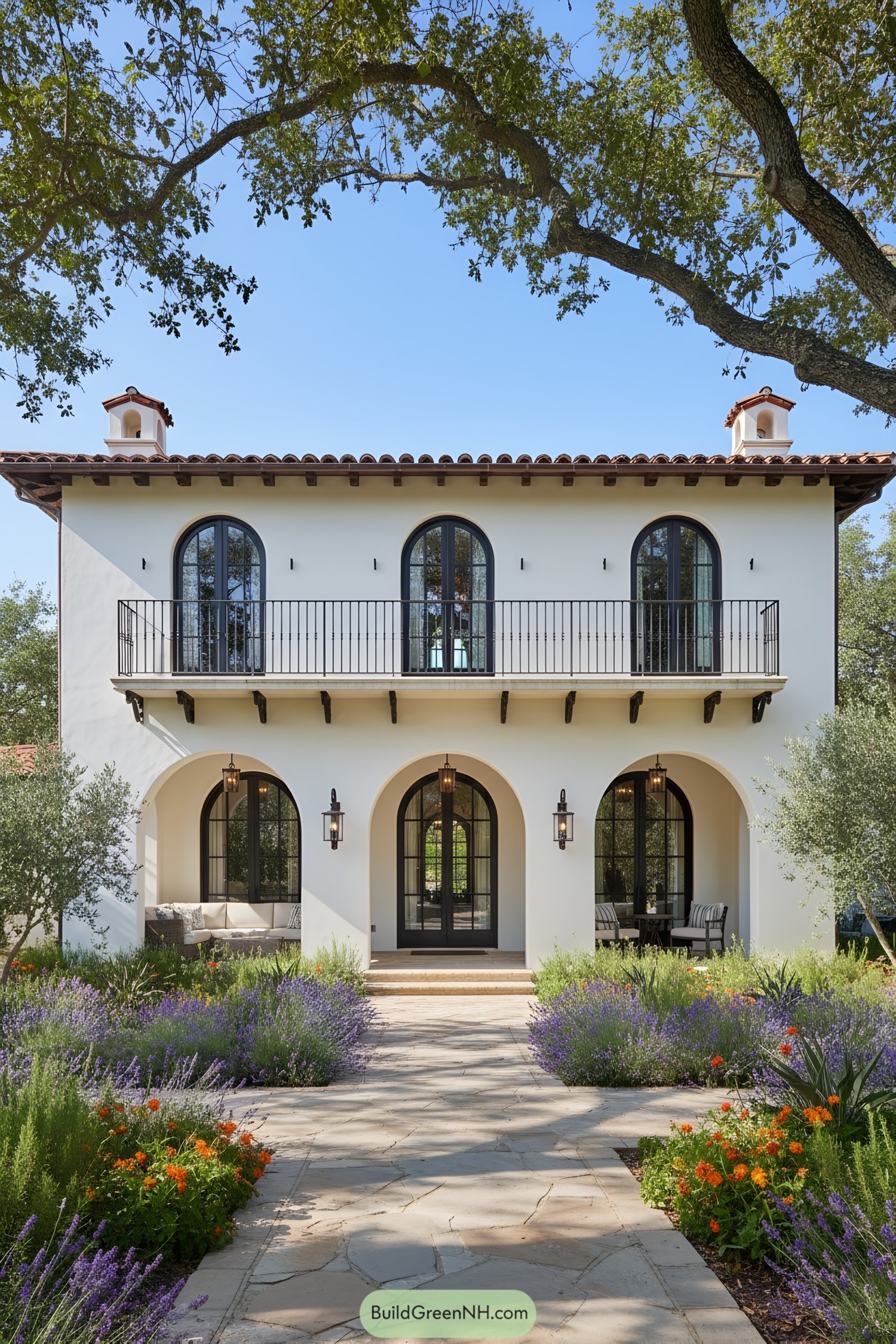 Quaint Spanish Mediterranean house with arches and a garden path