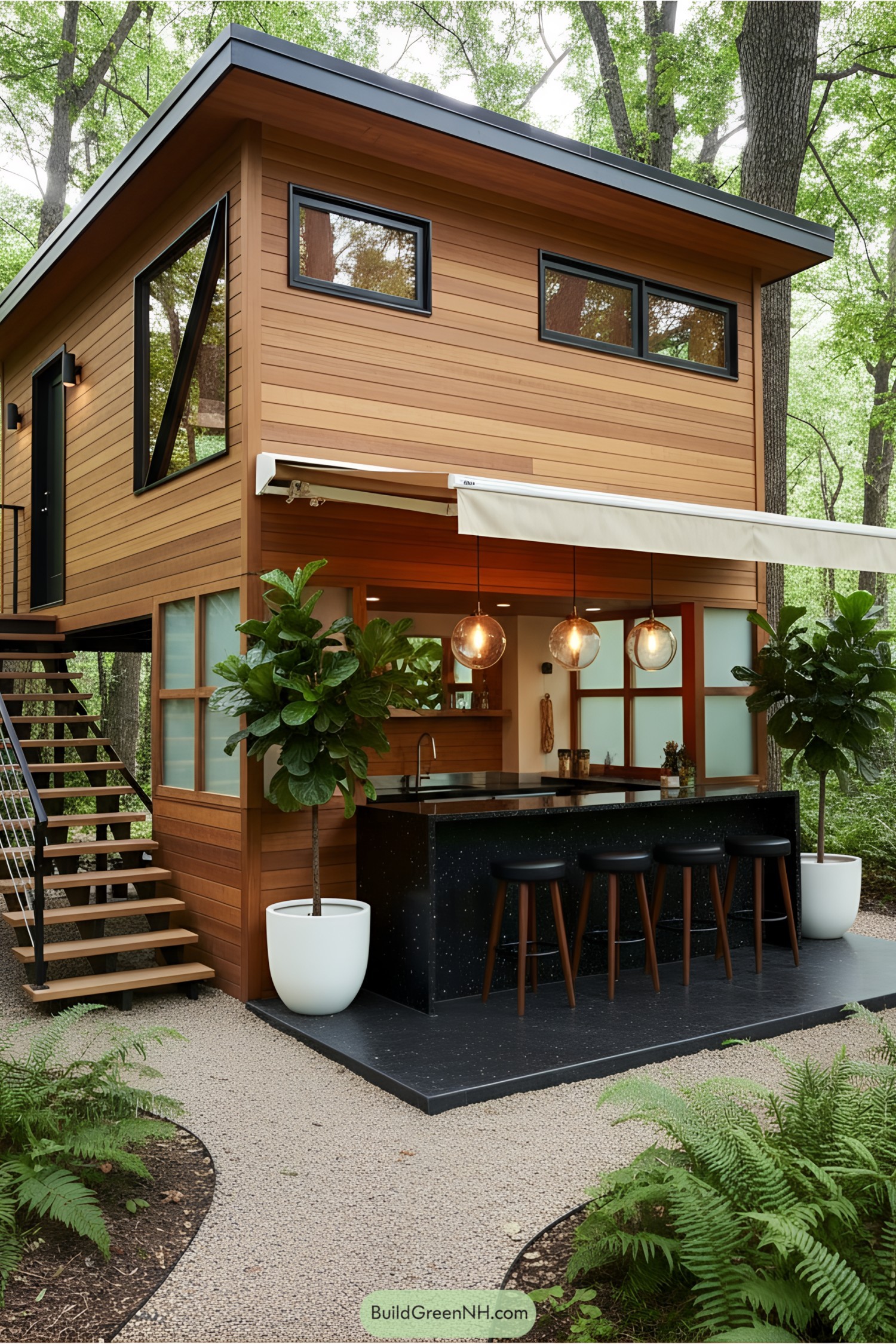 Modern cabin elevated among lush greenery with a bar underneath
