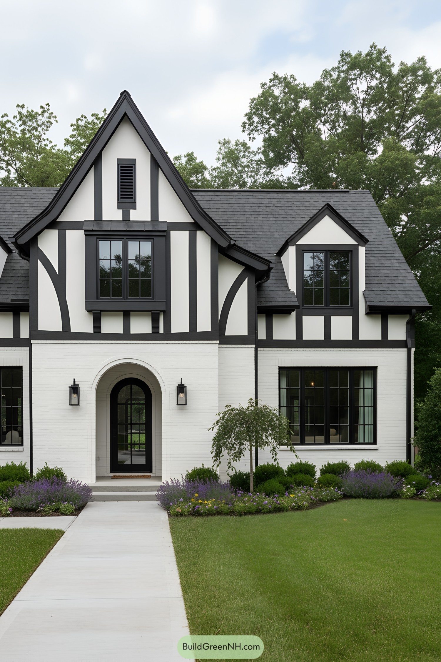 Black-and-white Tudor facade with arched entry