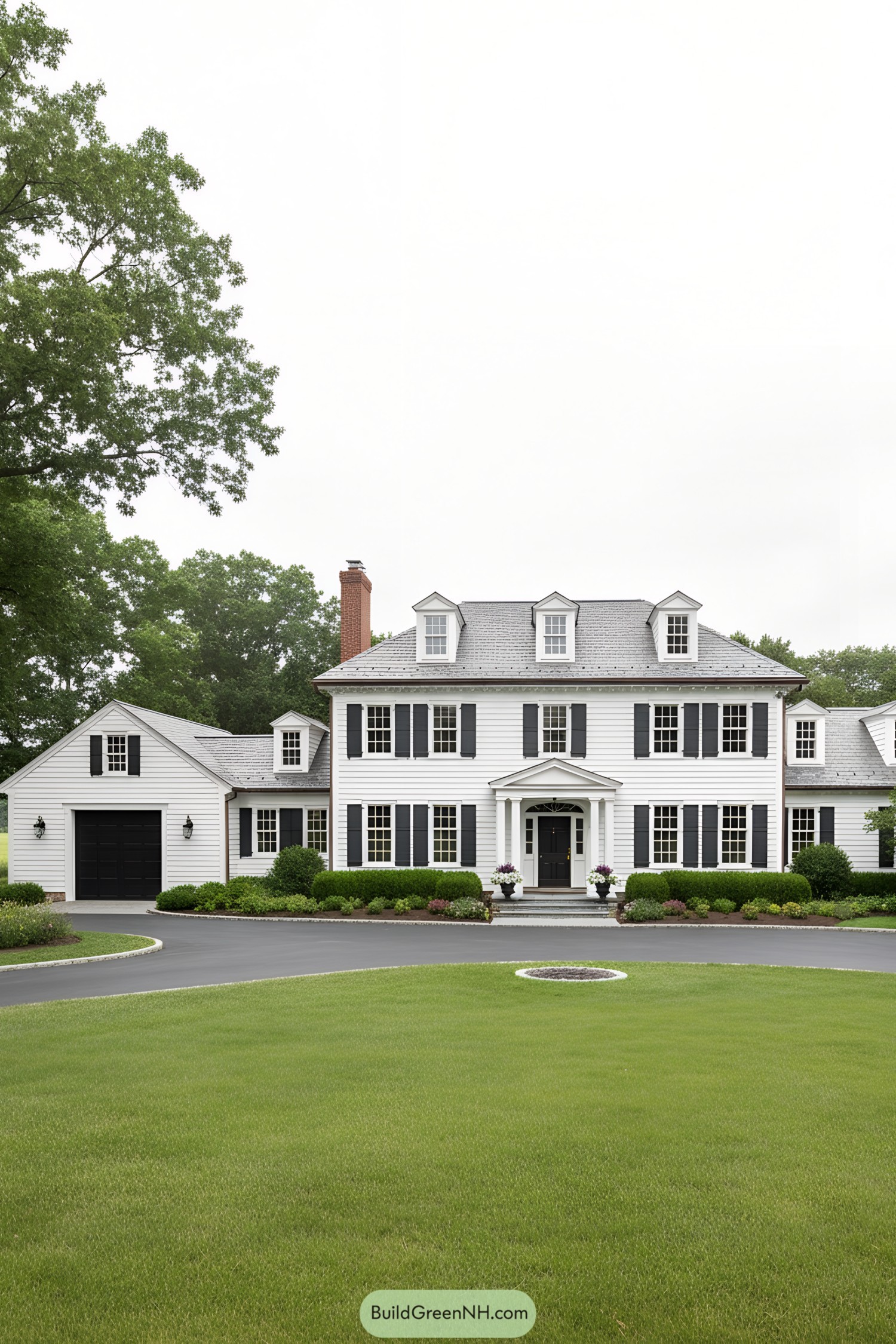 White clapboard Colonial with black shutters and dormers