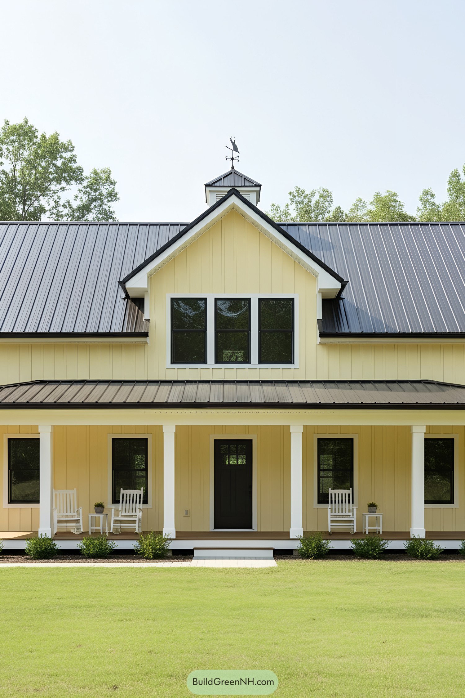 Yellow barndominium with rocking chairs and metal roof