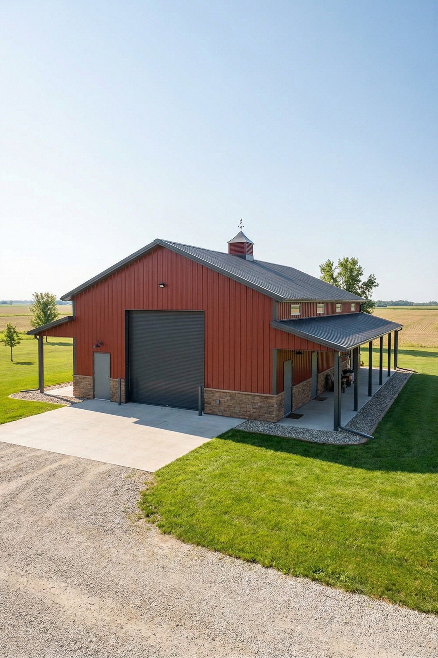 Red steel barn with wraparound lean-to porch