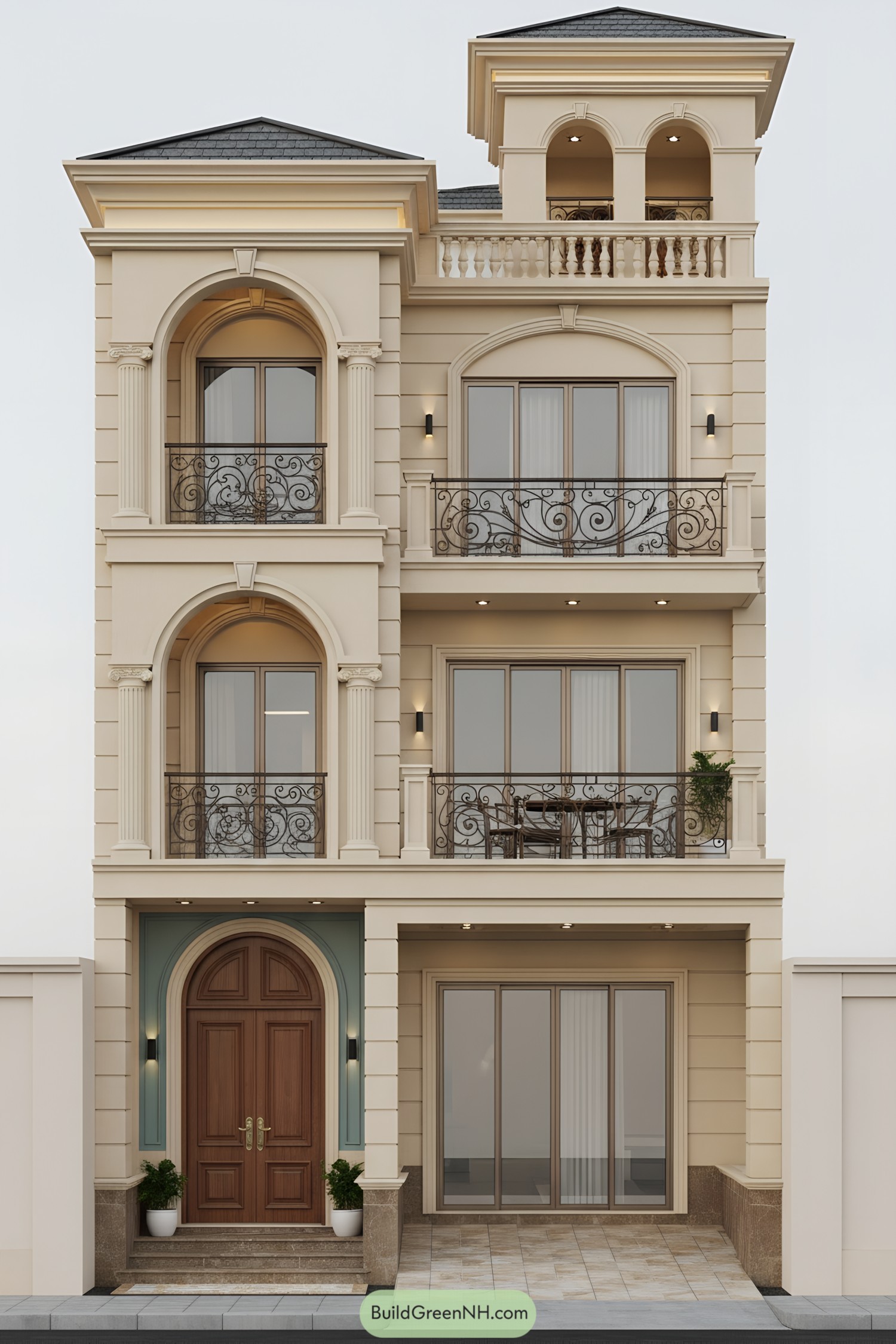 Cream stucco townhouse with arched balconies and ornate iron railings