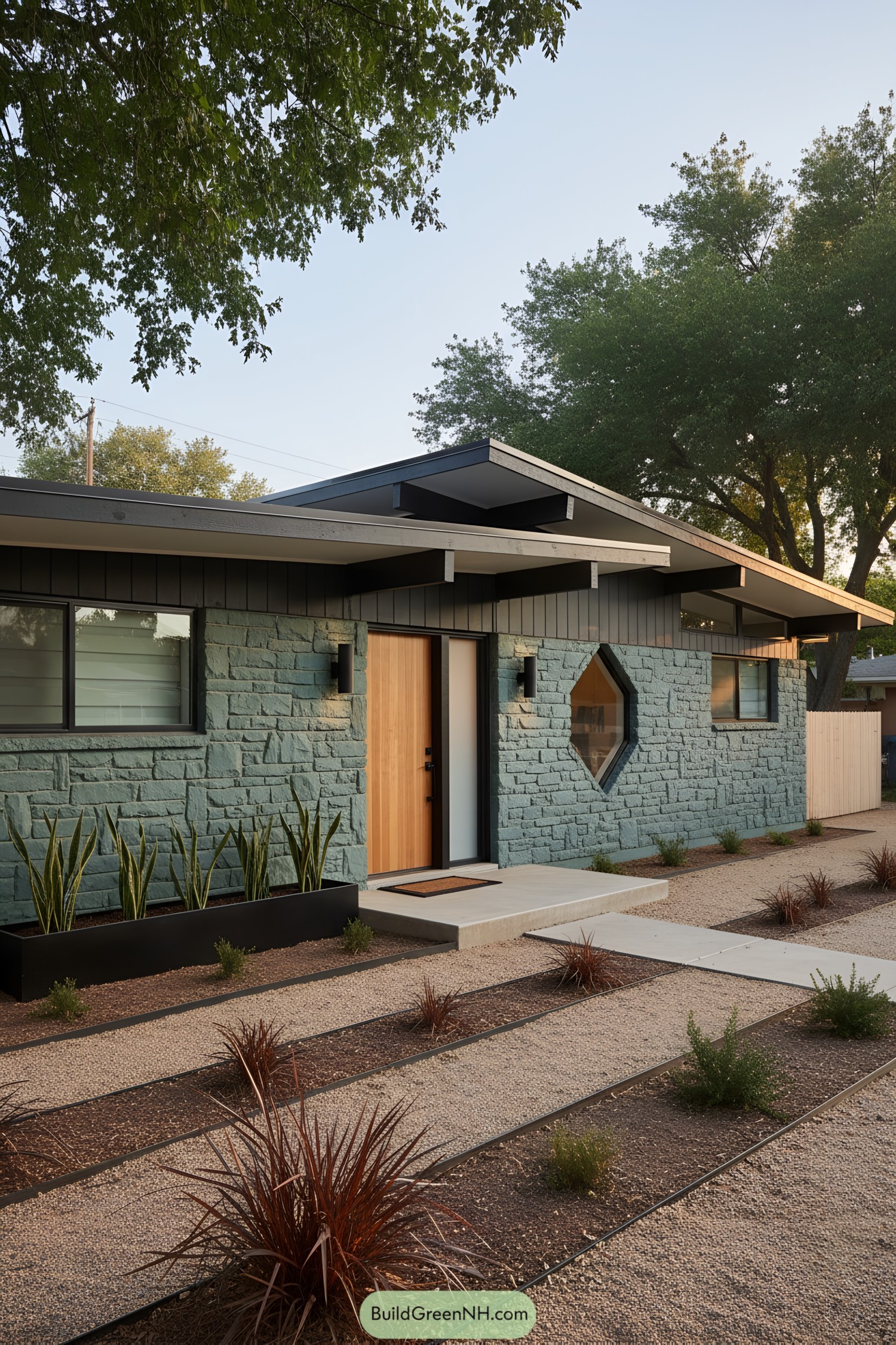 Midcentury ranch with teal stone facade and diamond window