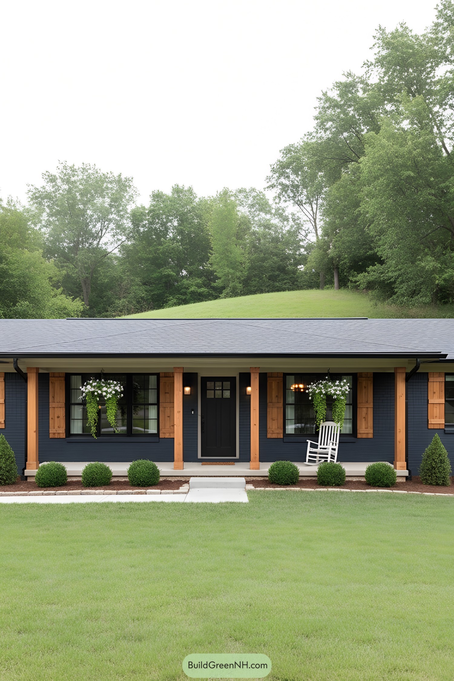 Dark-siding ranch with warm wood shutters and porch